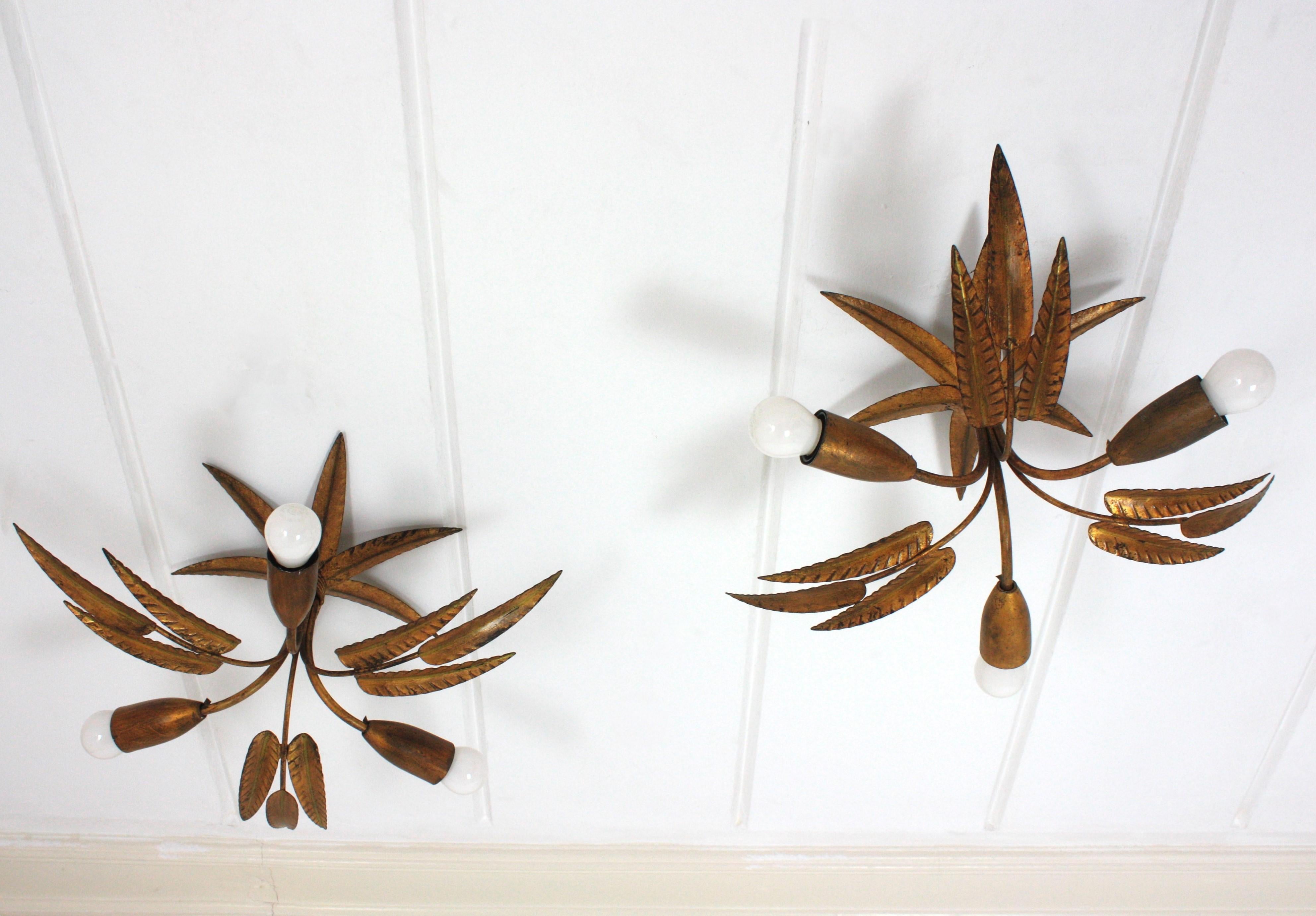 Mid-Century Modern Pair of Palmette Chandeliers or Pendants in Gilt Iron with Leaves Design For Sale