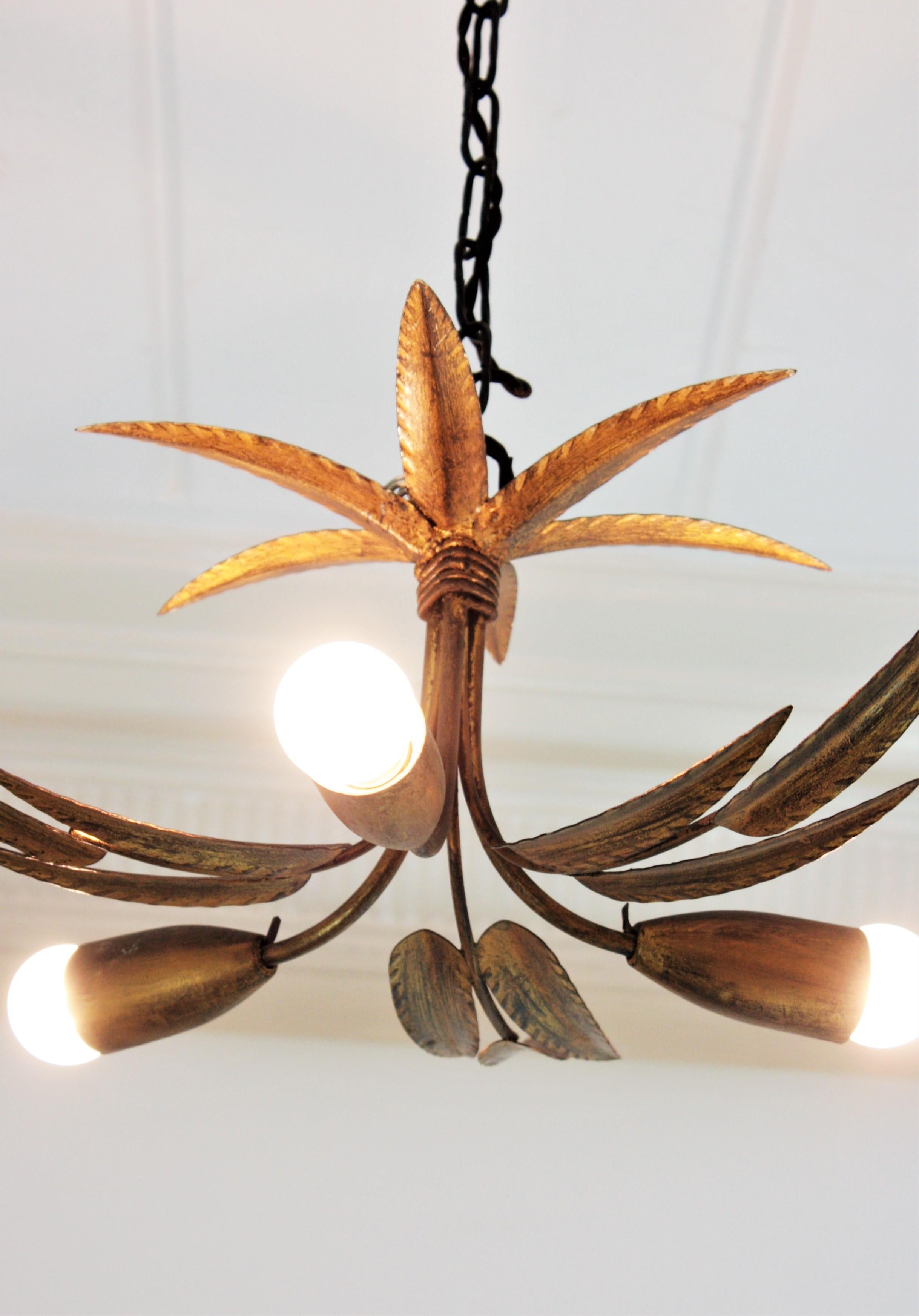 Hollywood Regency Pair of Palmette Chandeliers or Pendants in Gilt Iron with Leaves Design