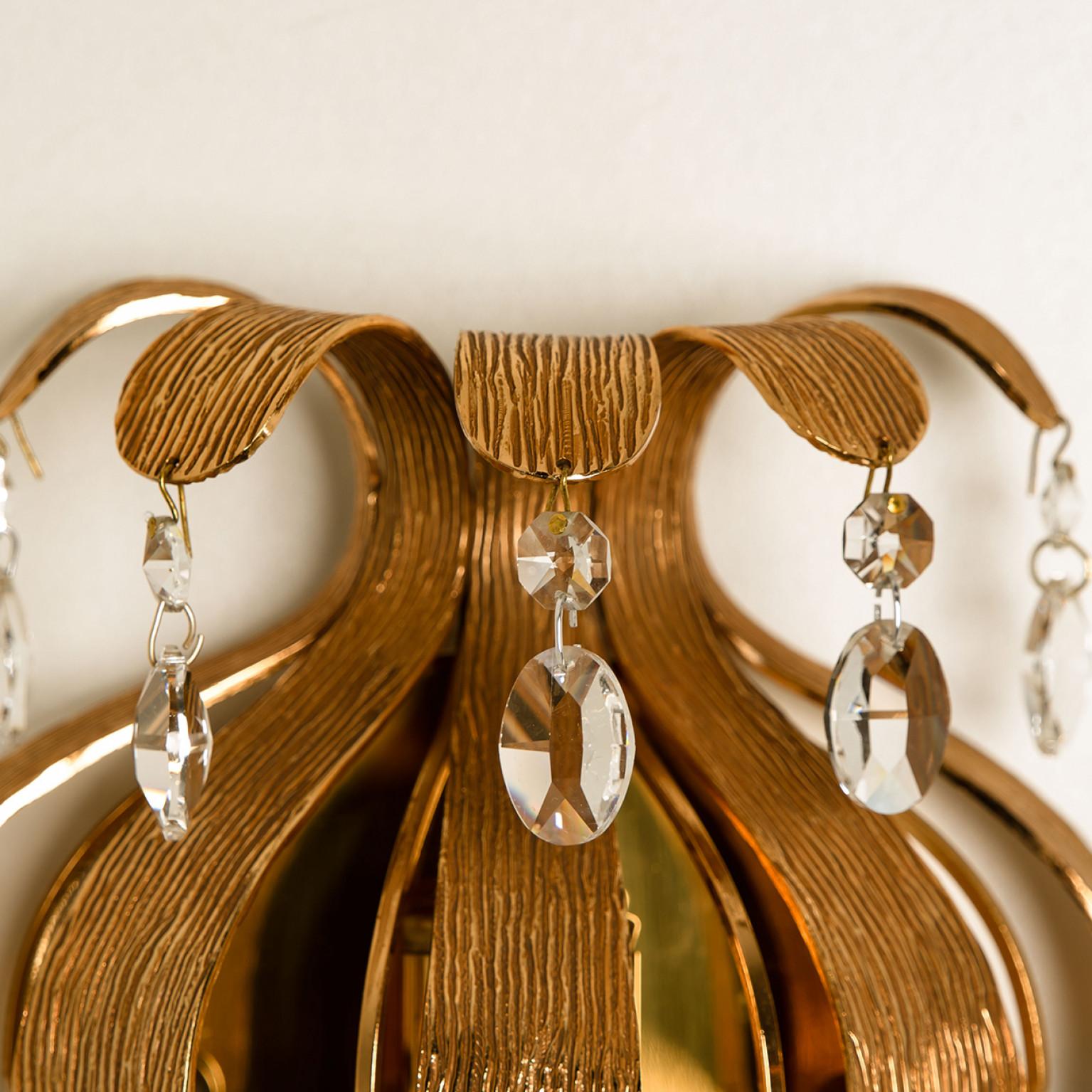 Palwa crystal wall light by Ernst Palme in Germany, 1960. Made with crystals and gold plated gilt brass, this wall light is a beautiful eye catcher.

Please note the price is for one piece.

Dimensions:
Height: 9.8″ (25cm)
Width: 8.3″ (21cm)
Depth: