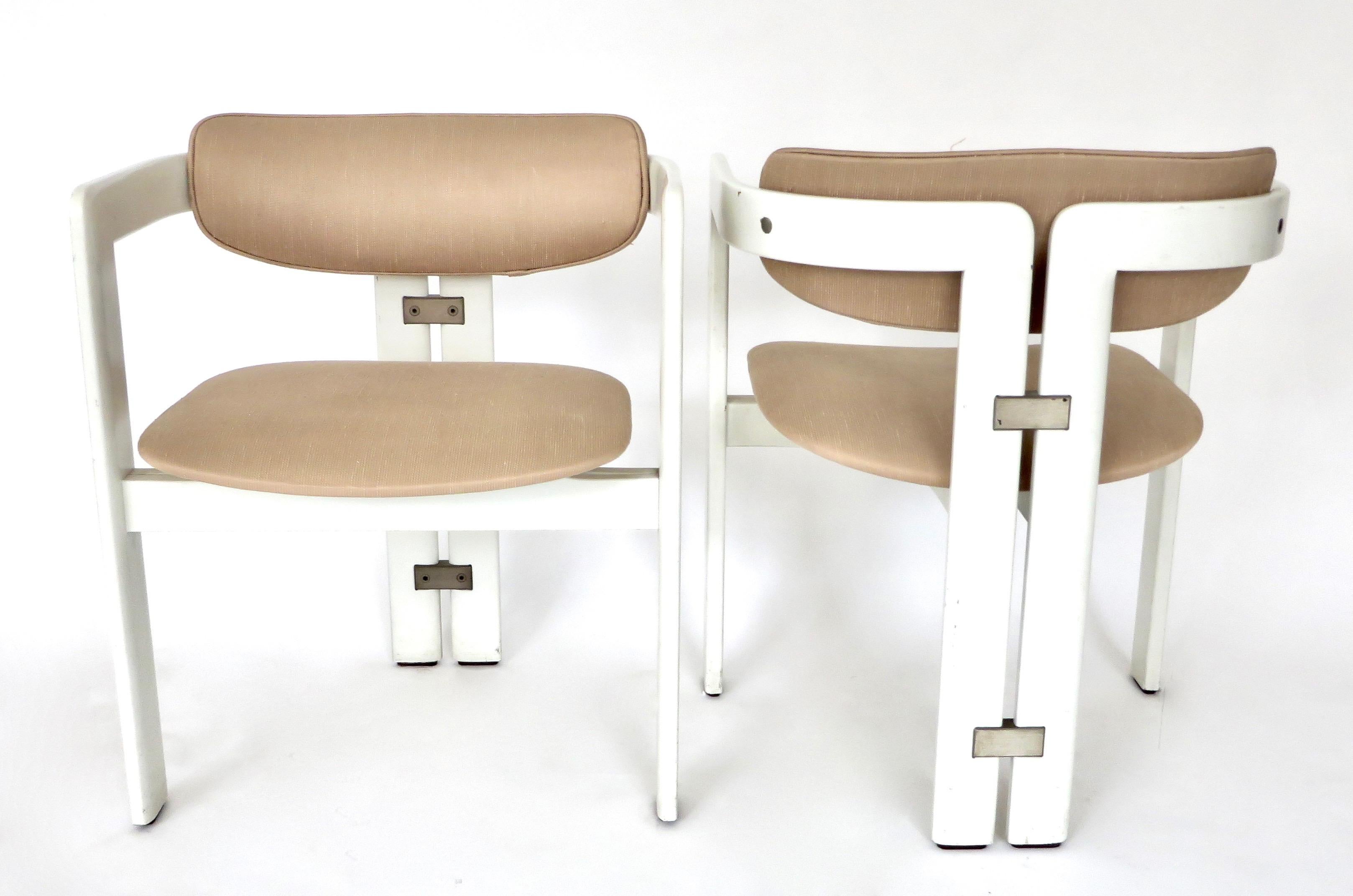 Pair of model Pamplona chairs by Augusto Savini for Pozzi, Italy, 1965.
White lacquer frame with original pale pink upholstery. Chrome-plated steel details.
All in the original patina. Some loss to the lacquer.
Great desk or occasional chair or