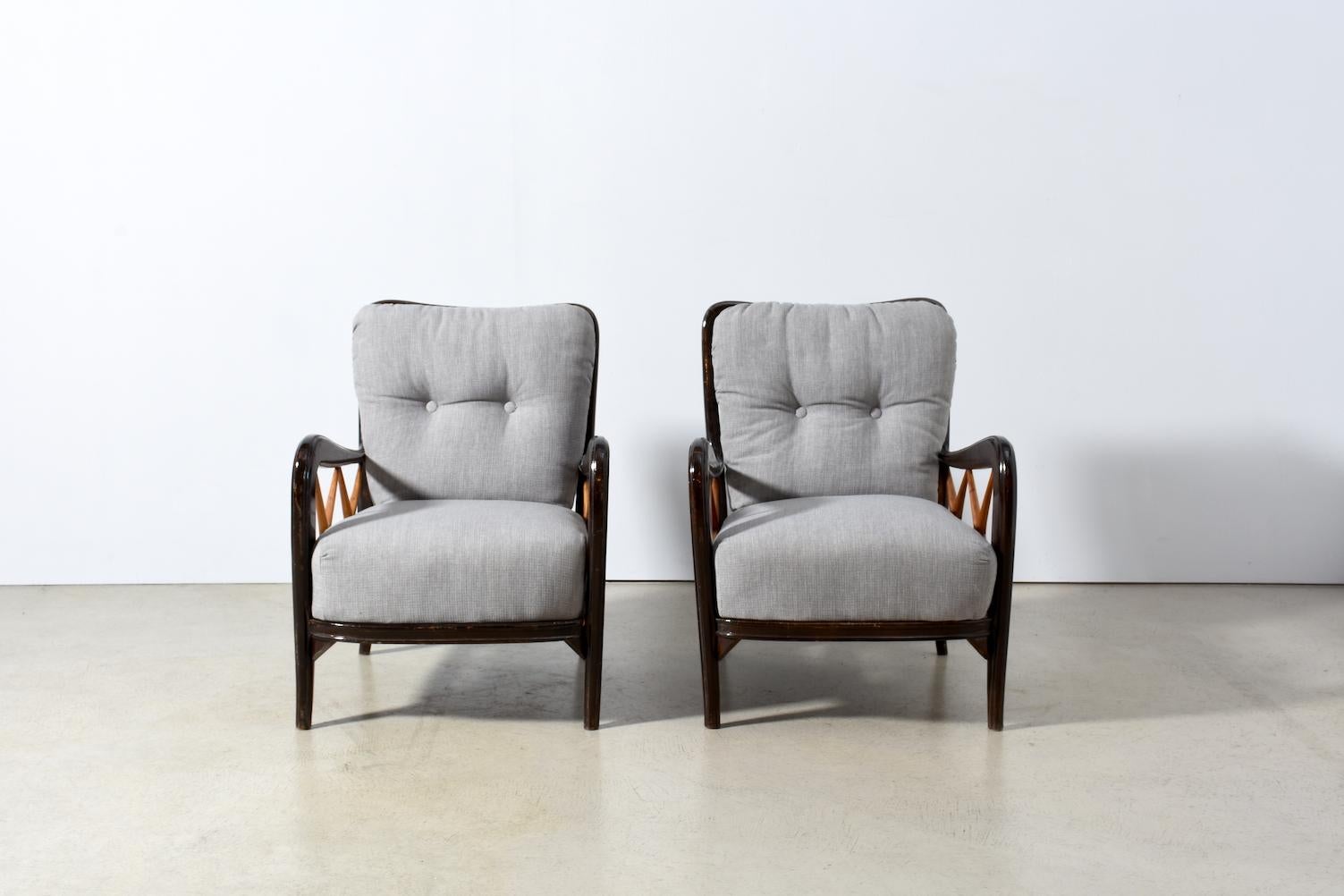 Armchairs with beautiful details in the chair structure. Classic elegance of the Italian, circa 1940s. Newly made pillows. Only for sale as pair.