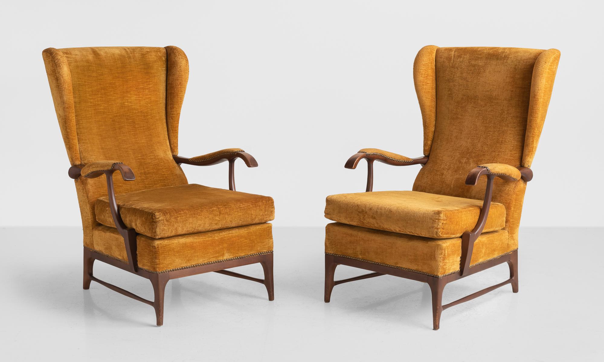 Pair of Paolo Buffa armchairs, Italy, circa 1960.

Designed by Paolo Buffa and manufactured by Framar. Carved wooden frame with original velvet upholstery fitted with brass nails.

Measures: 27