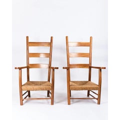 Paire de fauteuils à dossier en échelle dans le style de Paolo Buffa, c.1950s.