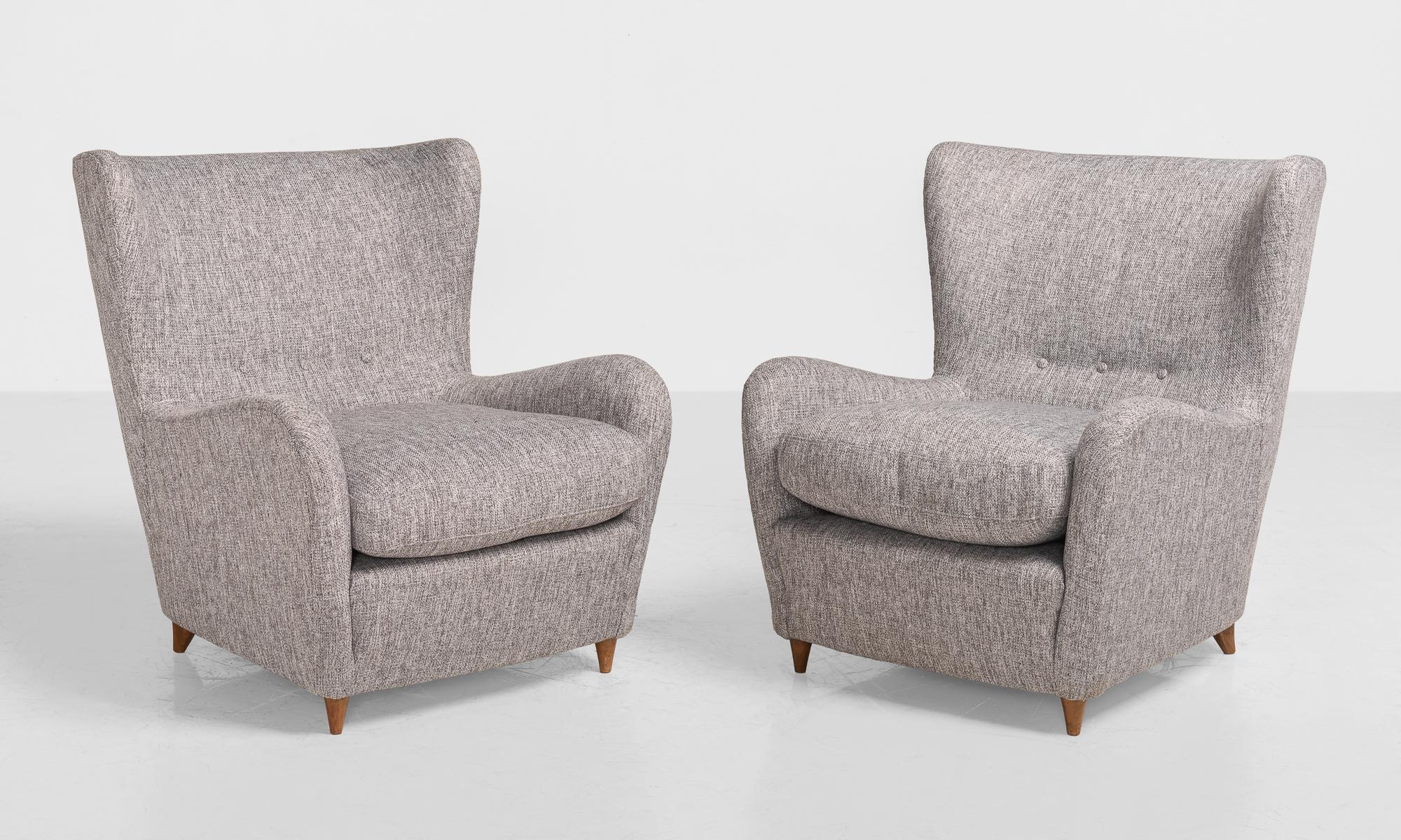 Pair of Paolo Buffa wool armchairs, Italy, circa 1950.

Newly upholstered in wool, with wooden feet.
 
Measures: 29.5