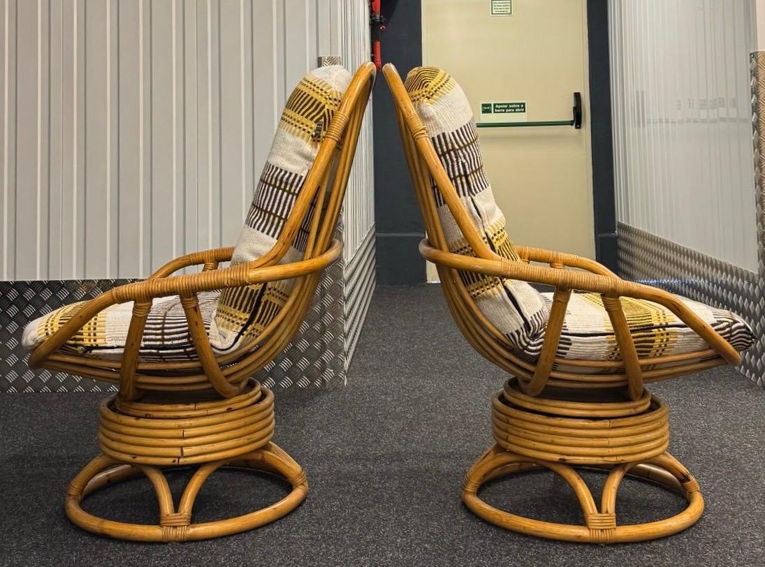 20th Century Pair of Bamboo and Rattan Swivel Lounge Chairs with Woven Cushions