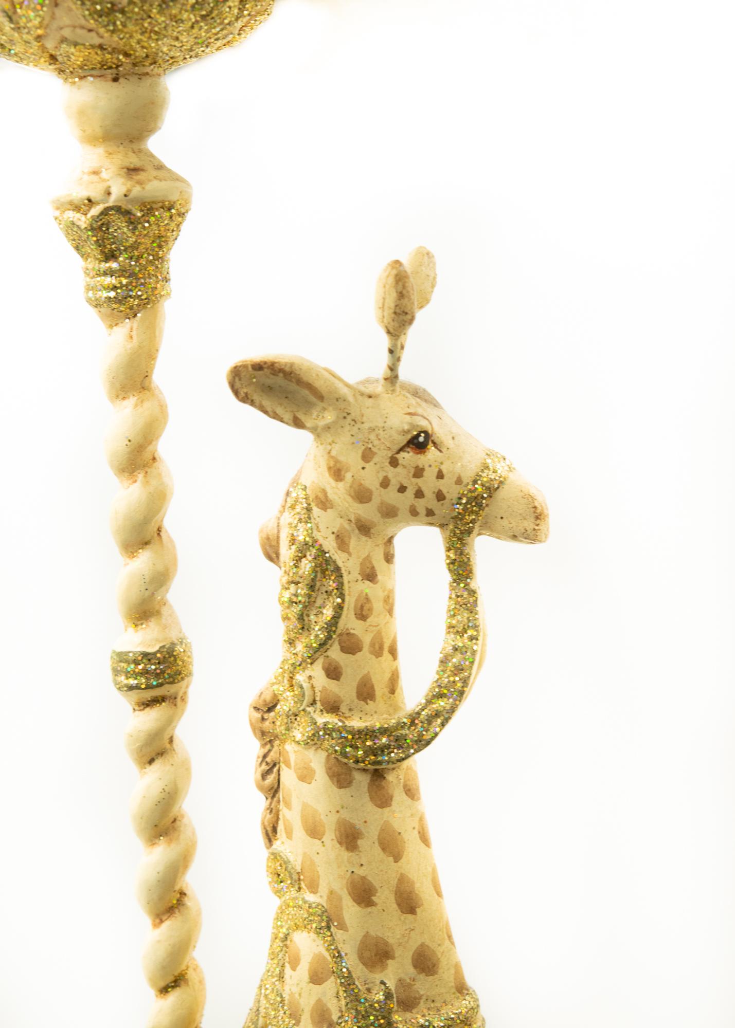 These fun caliope giraffe candlesticks are perfect decor for a children's party, an African Theme Party of Just Plain Funky. They are gilt and easy adornments for whatever you choose.