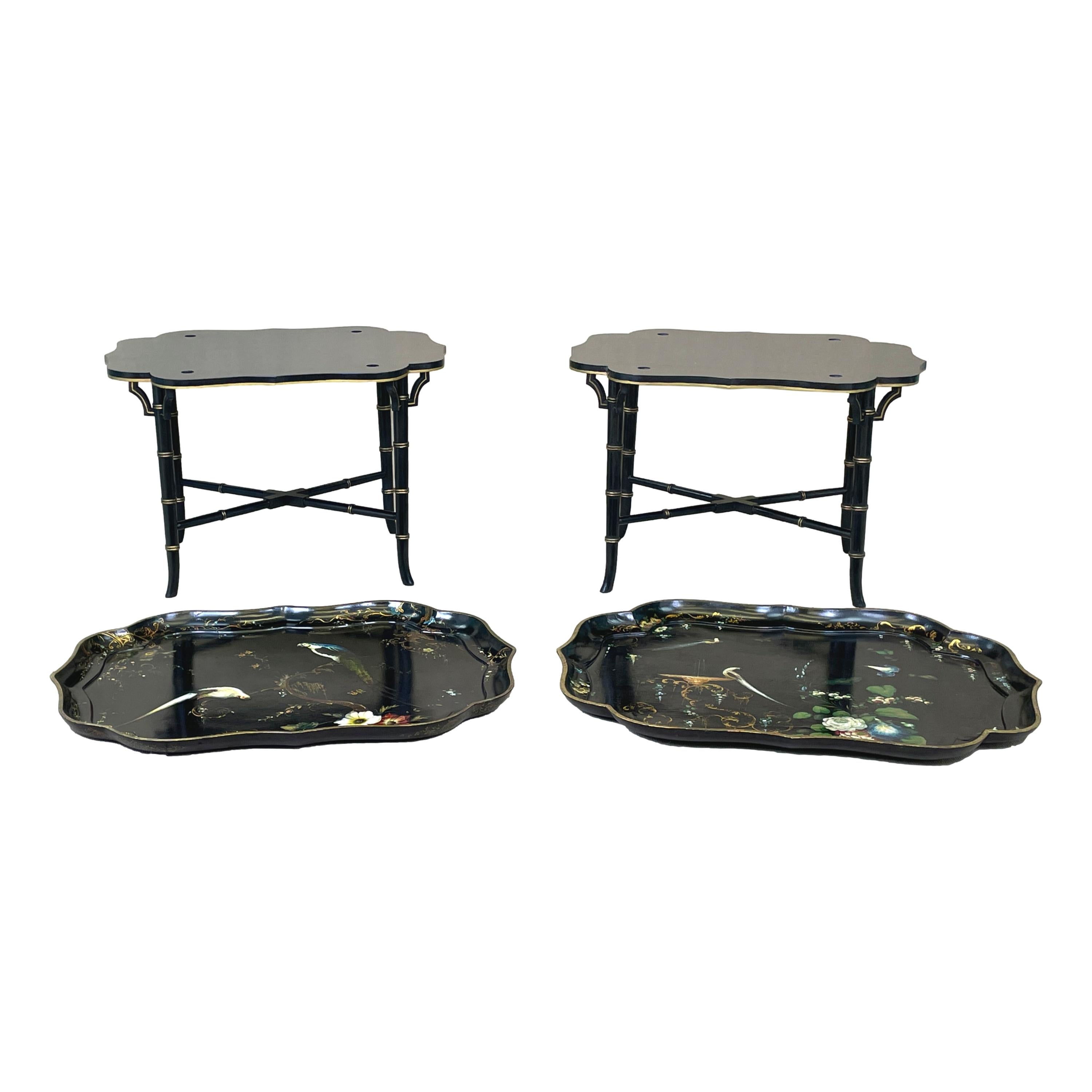 A delightful and rarely found matched pair of mid 19th century
papier maché tray on stands having elegant shaped
edges with hand painted and gilded decoration
housed on later bamboo design stands

(It is very rare to find a pair of these papier