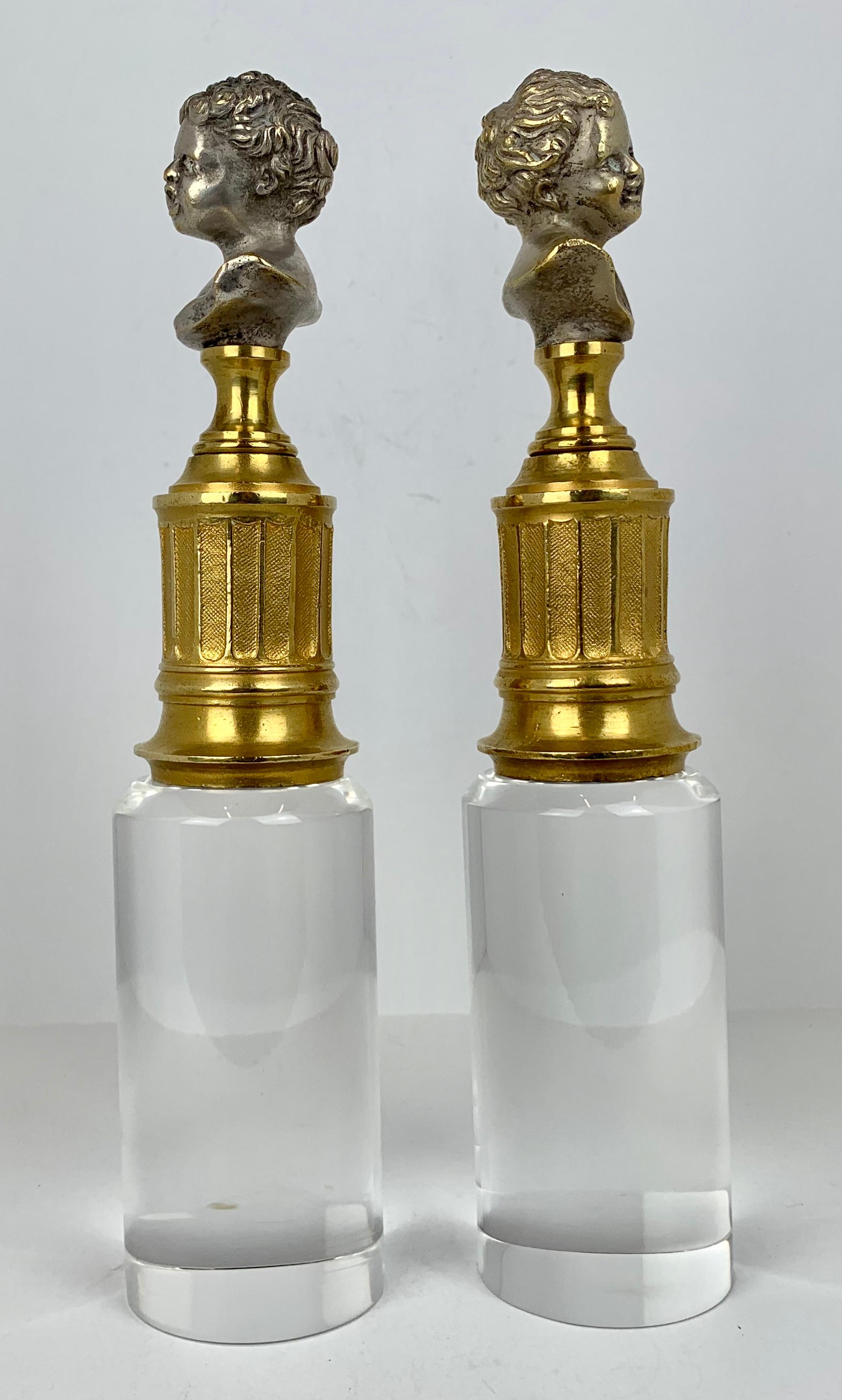 Late 19th Century Crying Babies in Gilt  Bronze on Fluted Columns after Jean-Antoine Houdon For Sale