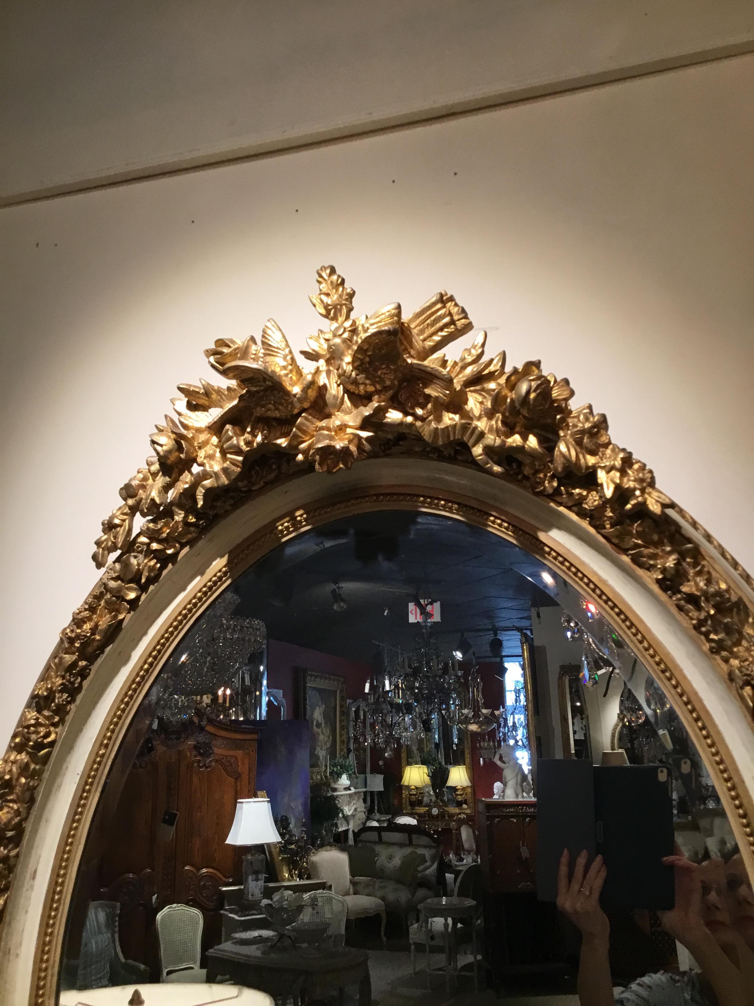 Pair of Parcel Paint and Parcel Gilt Beveled Oval Mirrors, with Bird Carvings 2