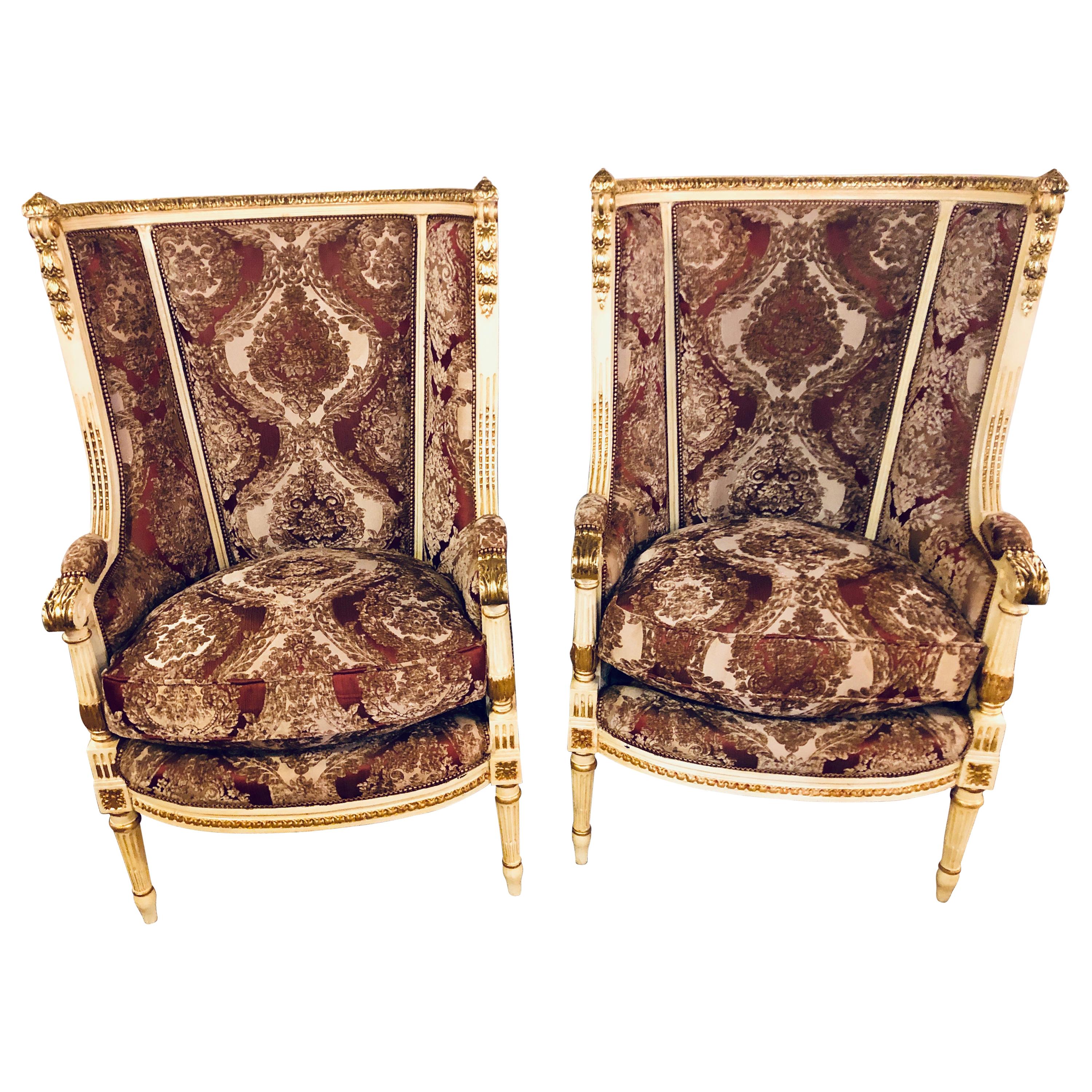 Pair of Parcel Paint and Gilt Decorated Louis XVI Style Wingback Armchairs