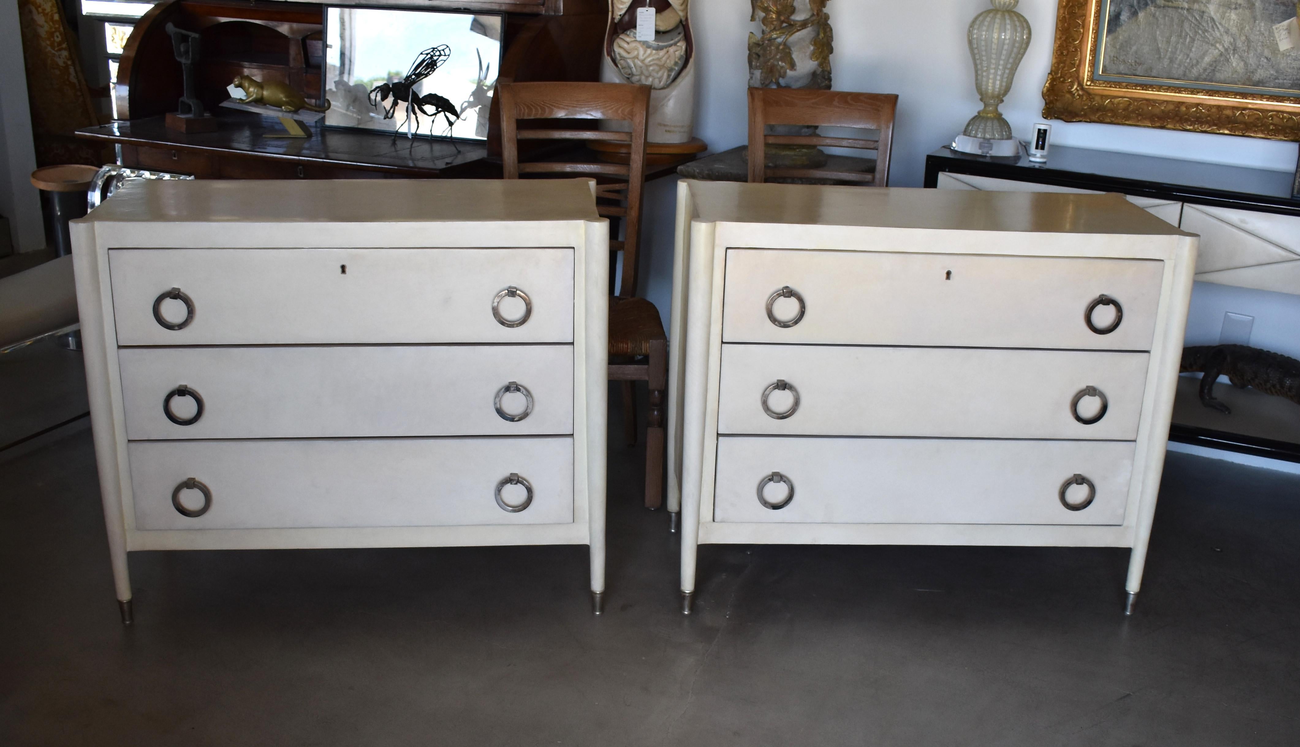 Pair of commodes or nightstands covered with natural goatskin. Each chest has three drawers (no key).

Color of parchment: Natural and light beige vintage look.
