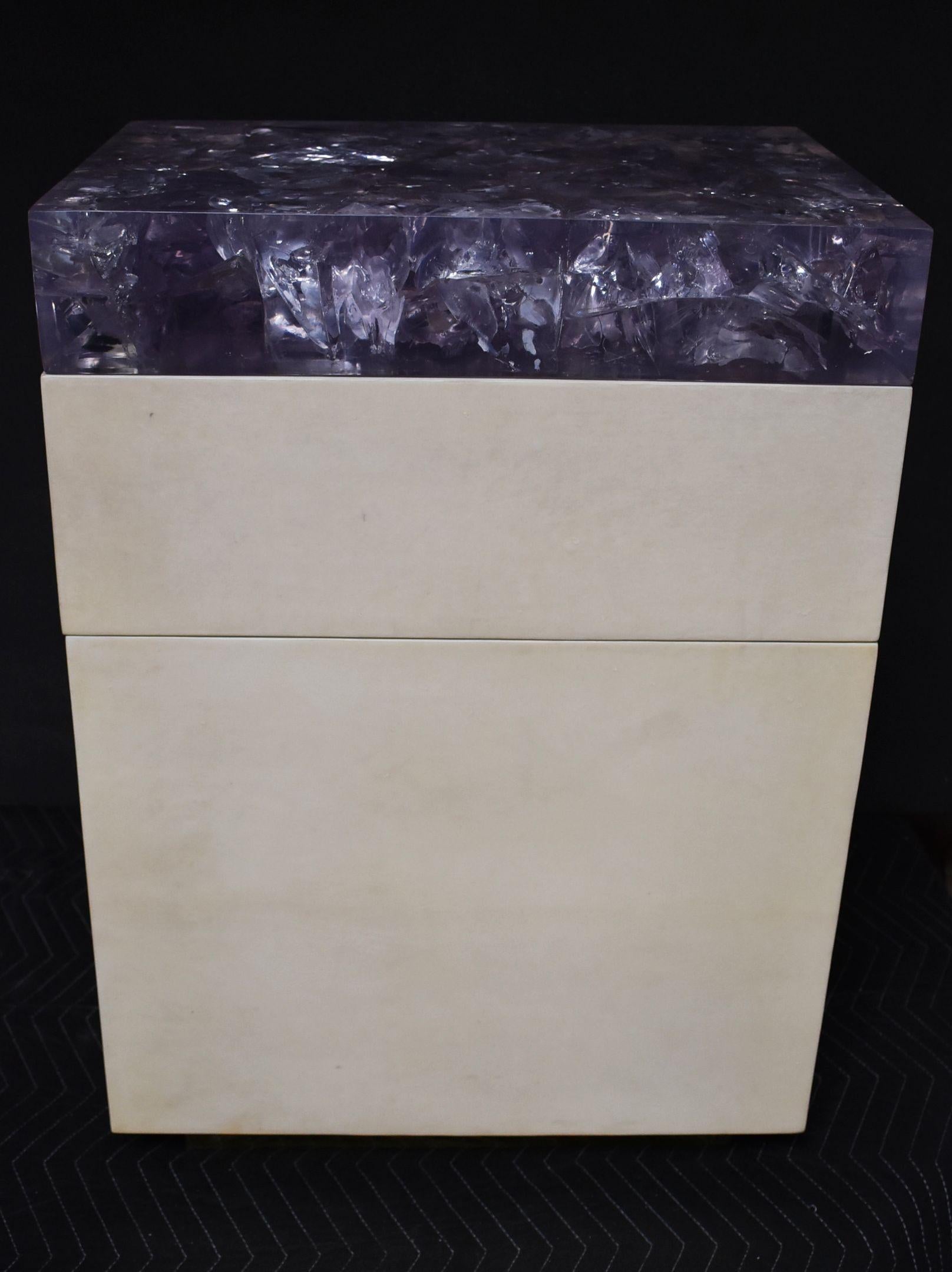 Pair of chests or nightstands covered with natural goatskin and purple ice cracked resin top high gloss hand polished. Brass base detail. Single draw, door and one shelf each stand. (Resin Top not Attach Can be Removed)

Color of parchment: