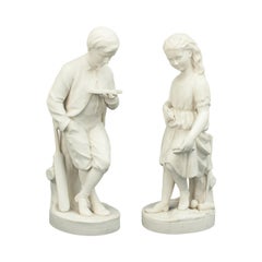 Paire de statuettes de Pariennes, la jeune Englans et sa sœur