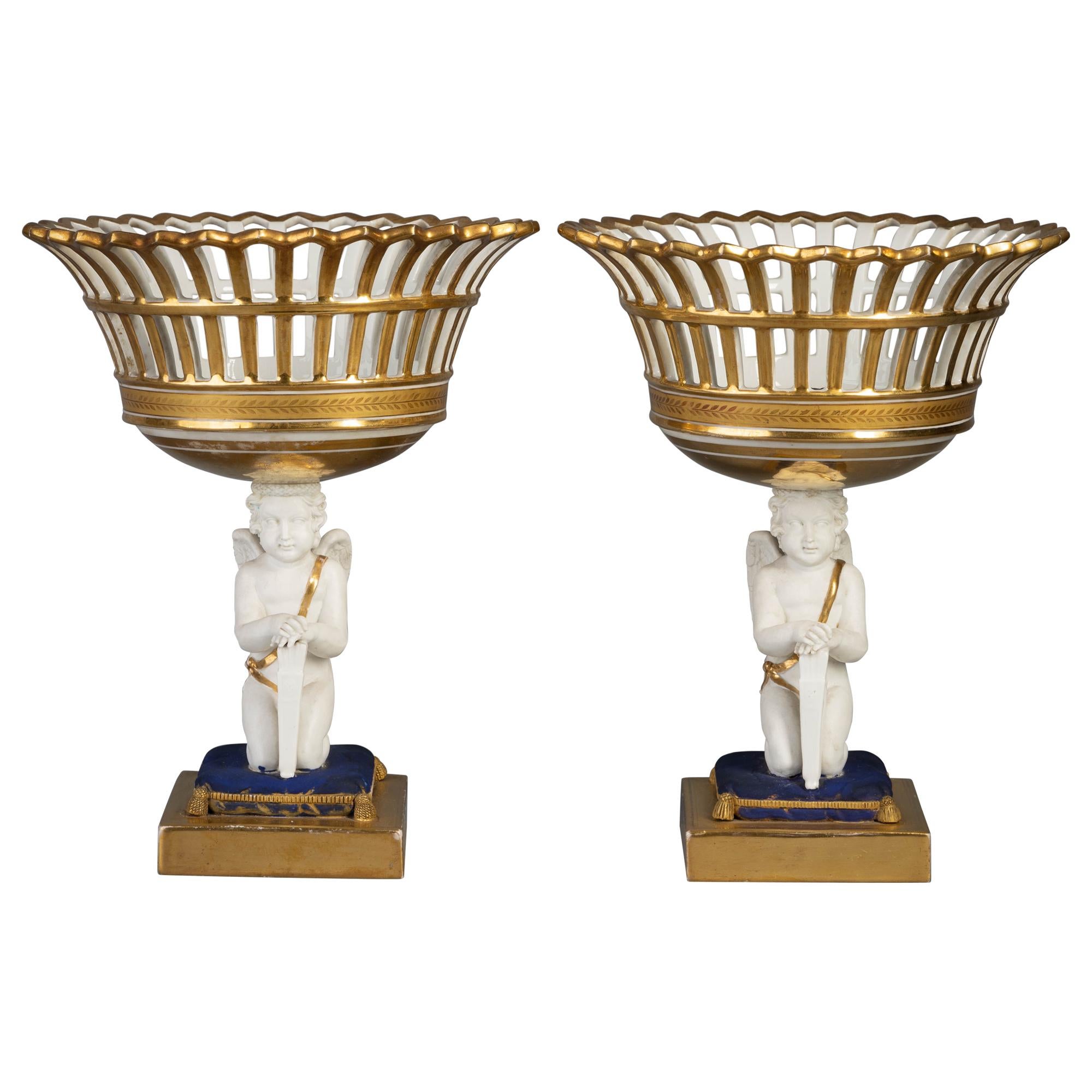 Pair of Paris Porcelain Figural Baskets, circa 1840 For Sale