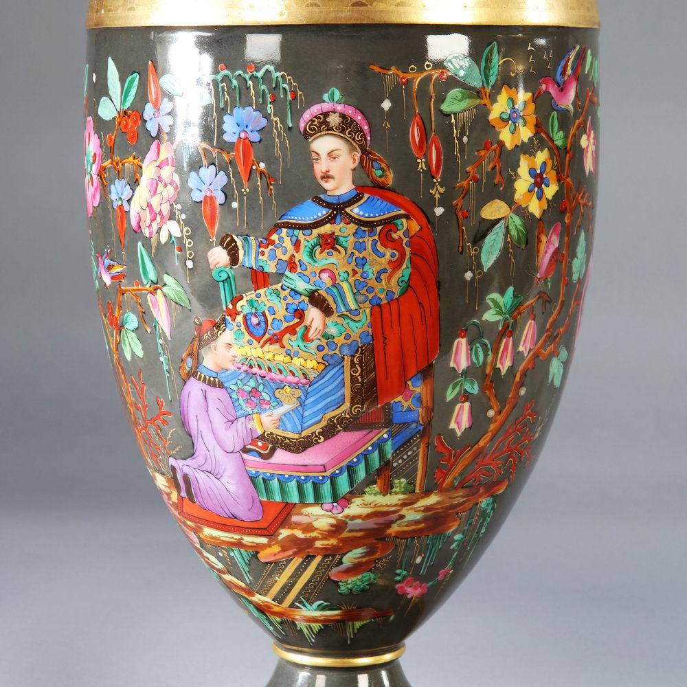 Large 19th century porcelain vase lamp decorated with flower-decked chinoiserie scenes on a charcoal colored ground.