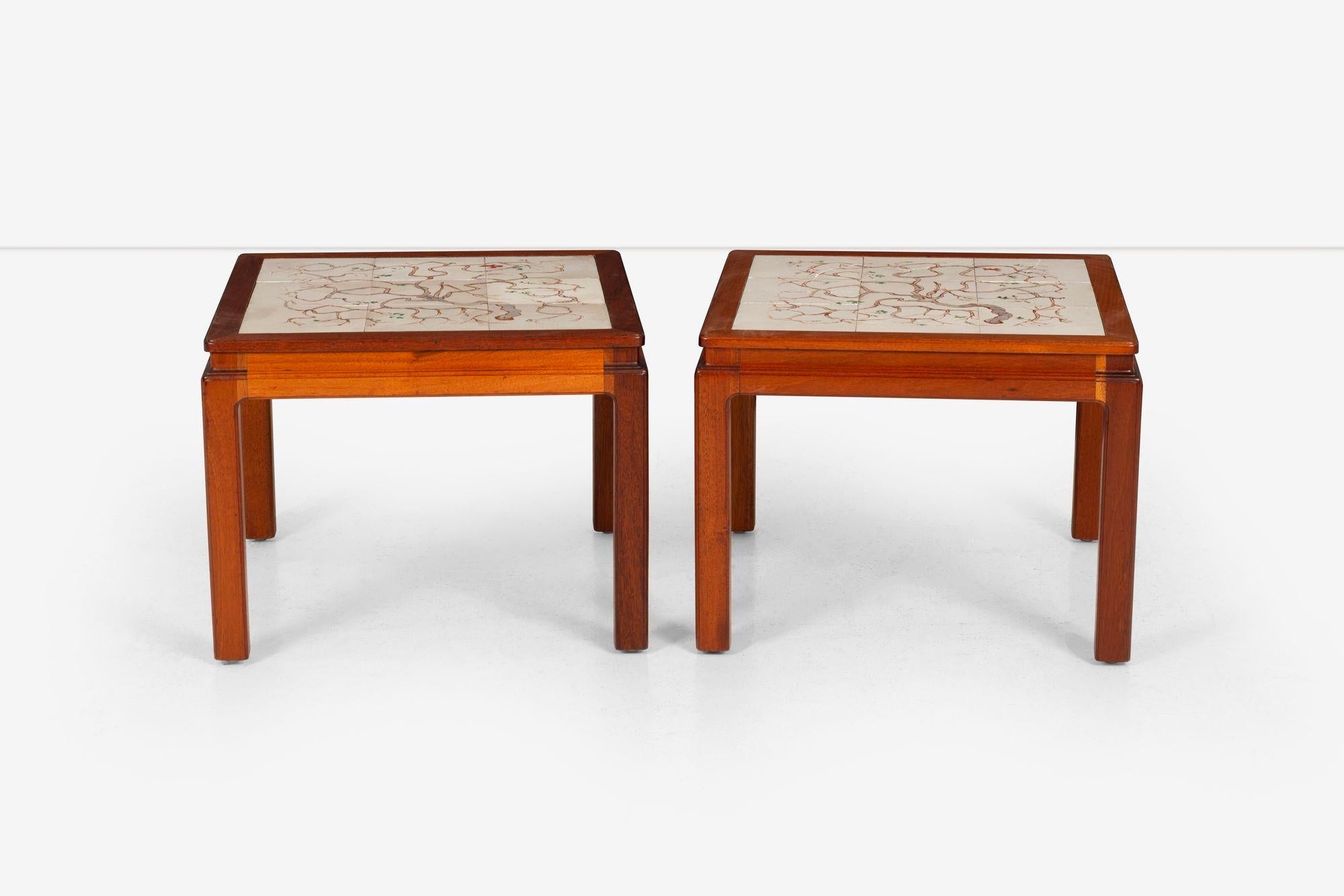 Pair of Parson End Tables by Edward Wormley for Dunbar with hand-painted tiles by Artist Maire Linna Wood frame with six hand-painted inset tiles depicting gnarled trees.
This is the first collaboration with Edward Wormley with the use of tiles,