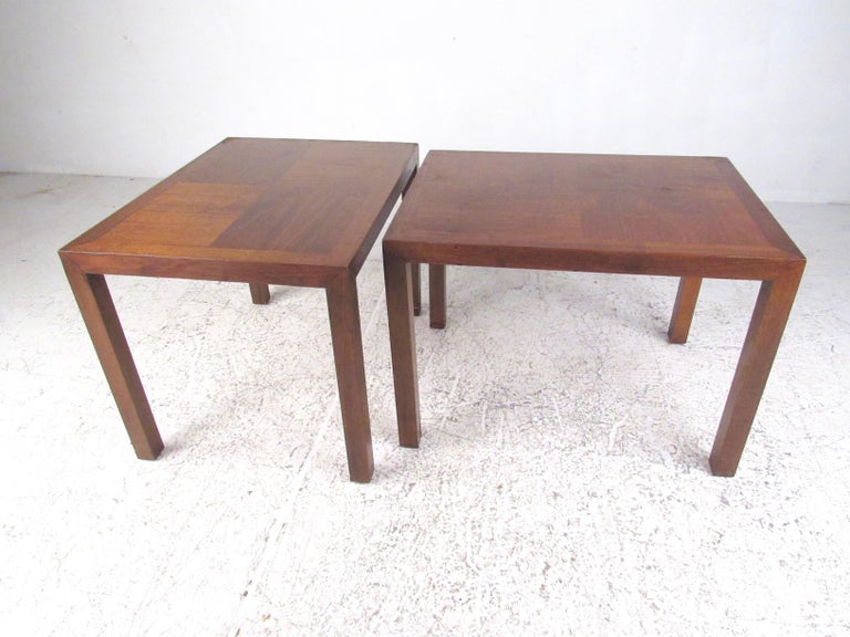 This stylish pair of Mid-Century Modern lamp tables feature rich walnut finish, and sturdy vintage construction by J.B. Van Sciver. Striking yet simple midcentury end tables work well in living room or waiting room, and add warm vintage wood tones