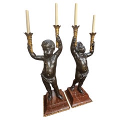 Pair of Patinanted Bronze Figural Torcheres