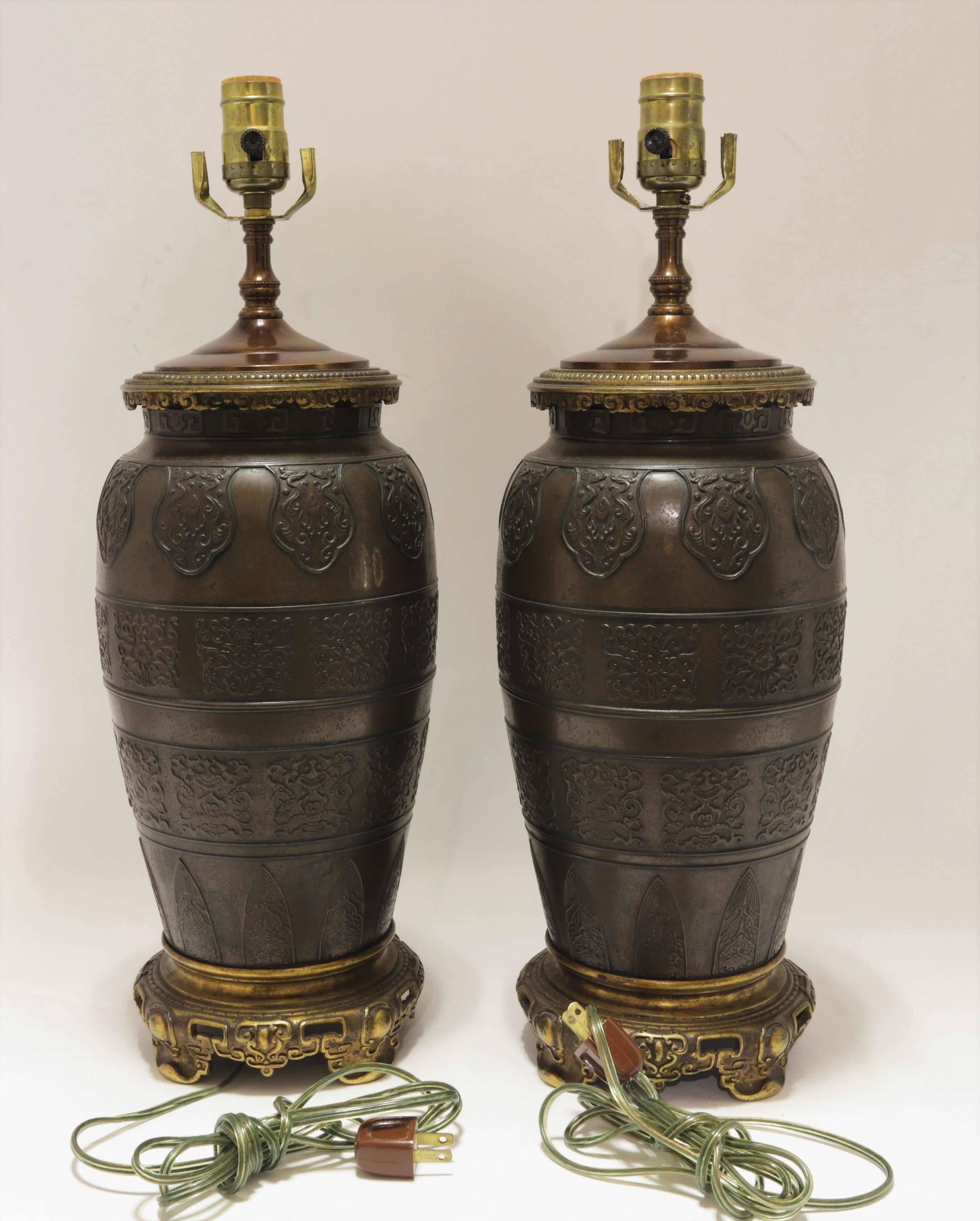 Pair of Patinated and Gilt Bronze Lamps Attributed to Caldwell & Co In Good Condition In New York, NY