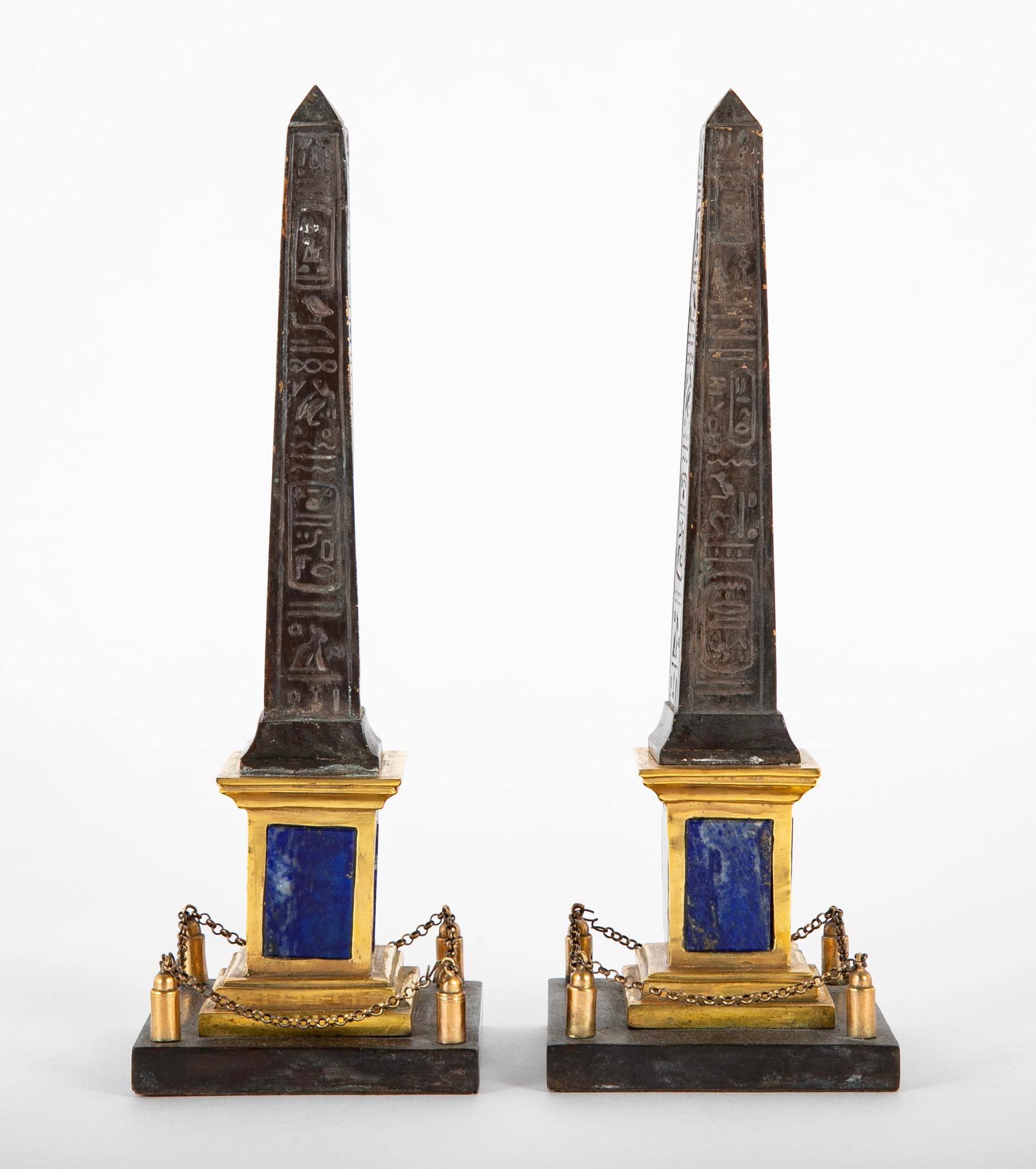 19th Century Pair of Patinated and Gilt Hieroglyphed Roman Obelisks For Sale
