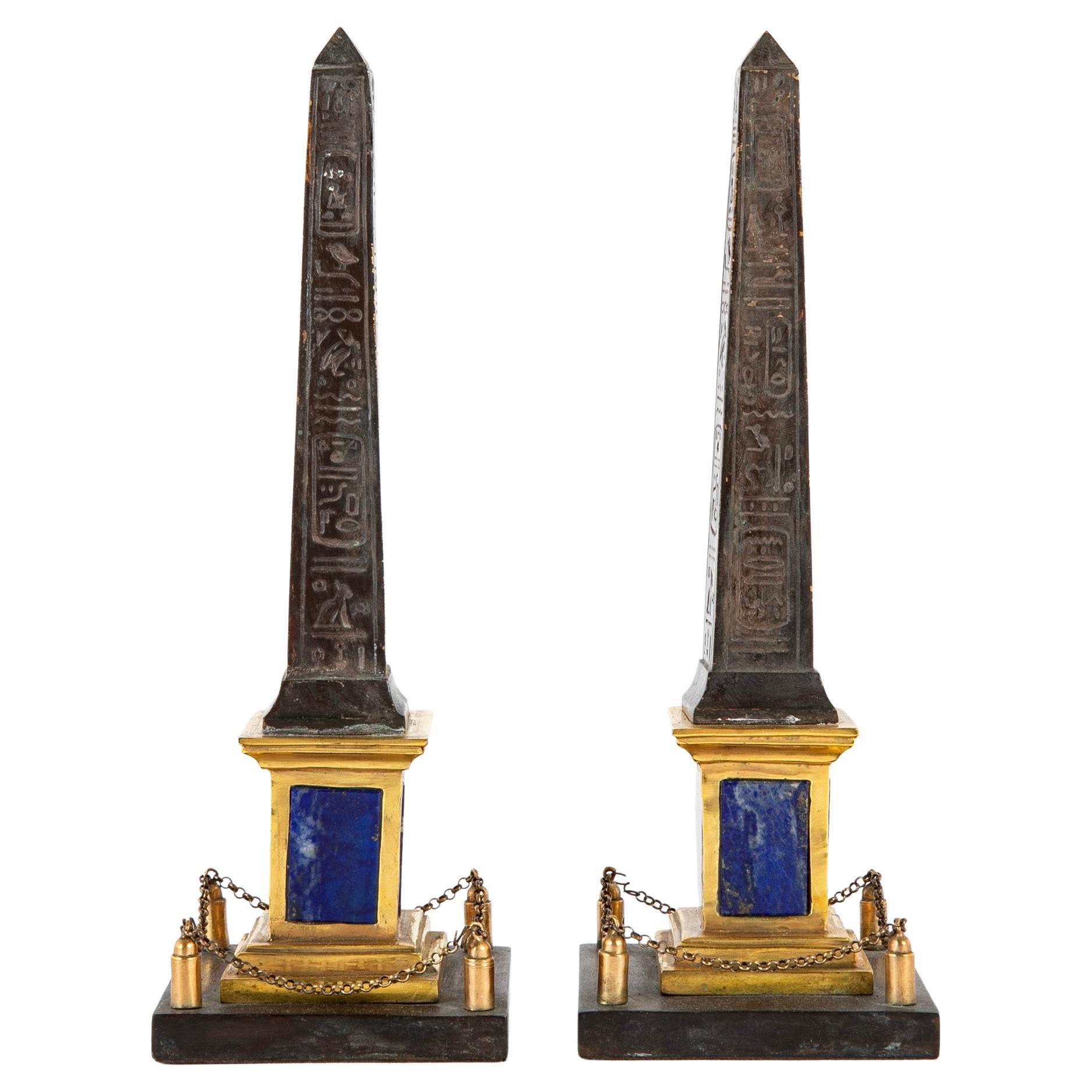 Pair of Patinated and Gilt Hieroglyphed Roman Obelisks For Sale