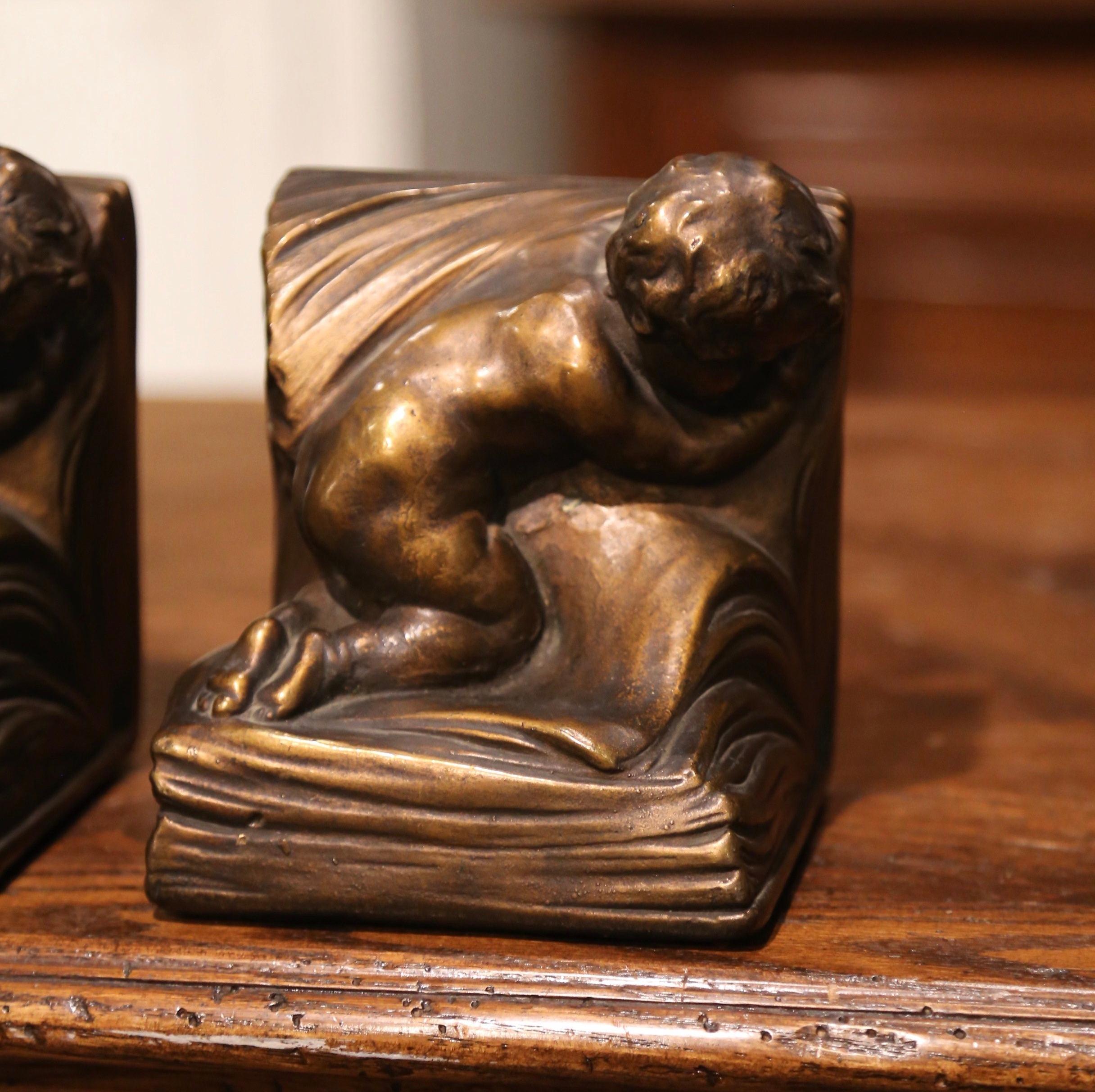 American Pair of Patinated Armor Bronze Cherub Bookends Signed and Dated CA Johnson 1914