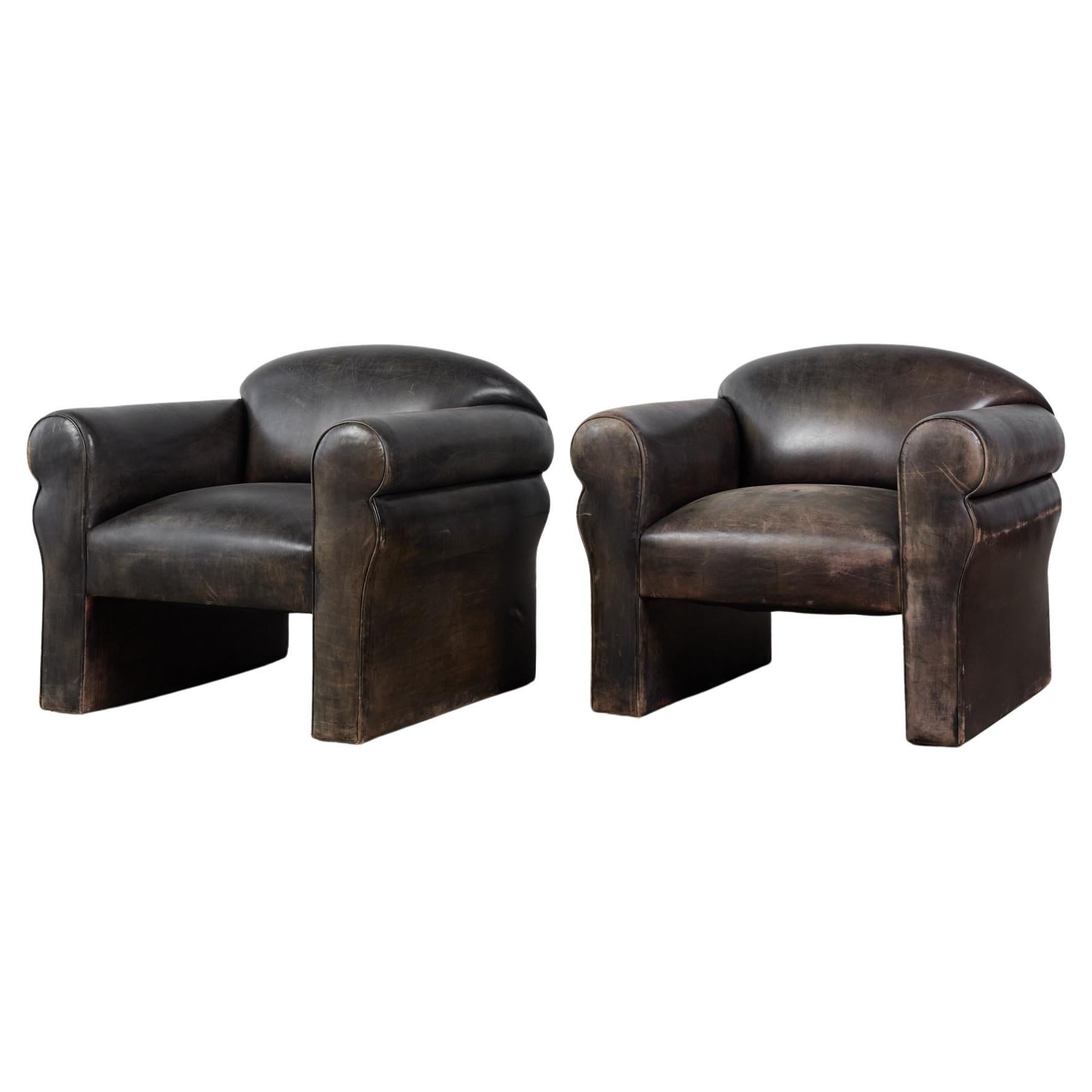 Pair of Patinated Black Leather Lounge Chairs