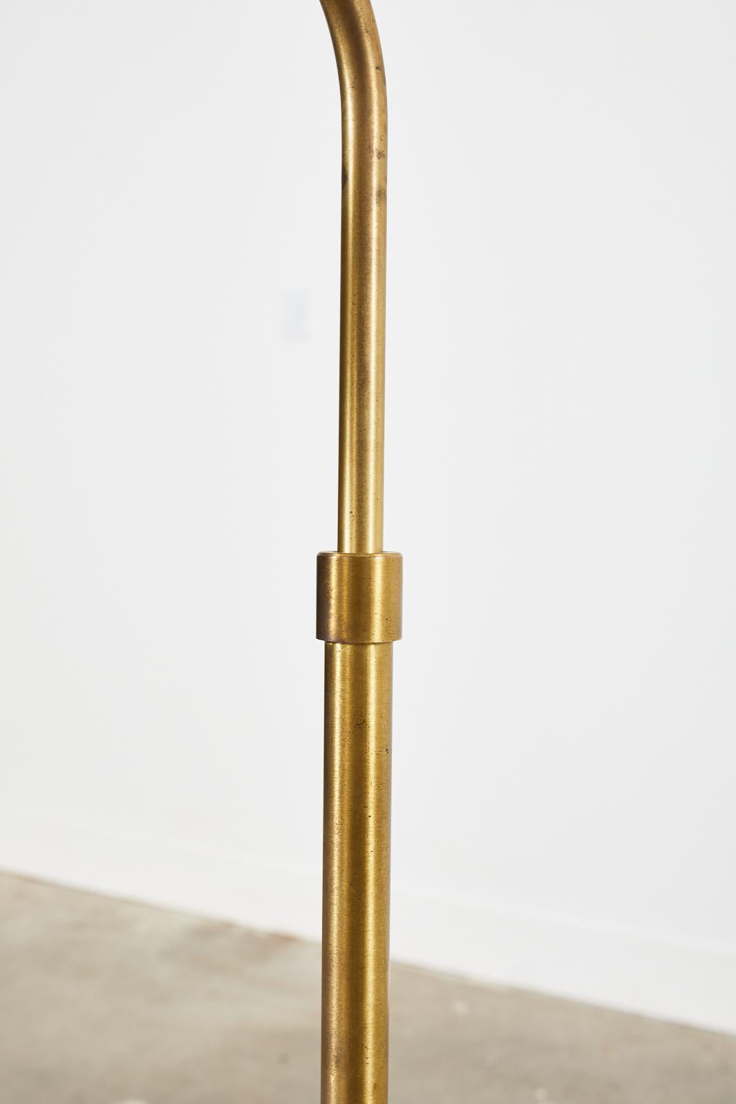 Pair of Patinated Brass Adjustable Pharmacy Floor Lamps 9
