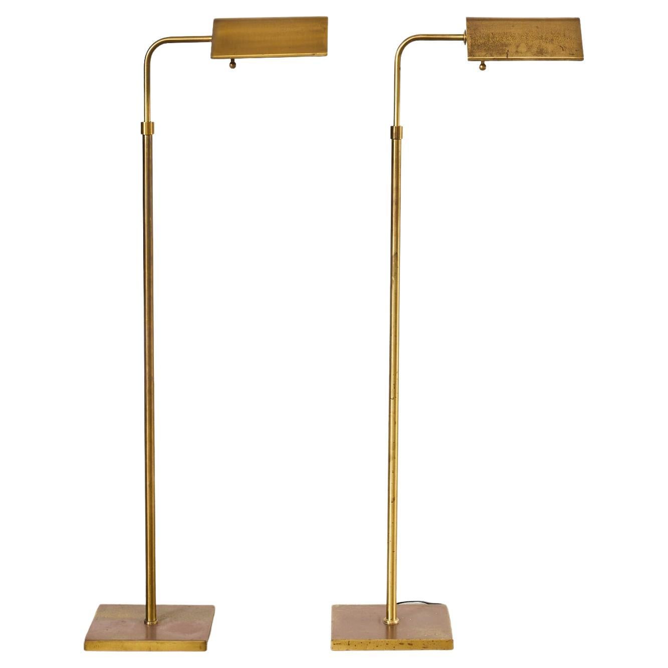 Pair of Patinated Brass Adjustable Pharmacy Floor Lamps