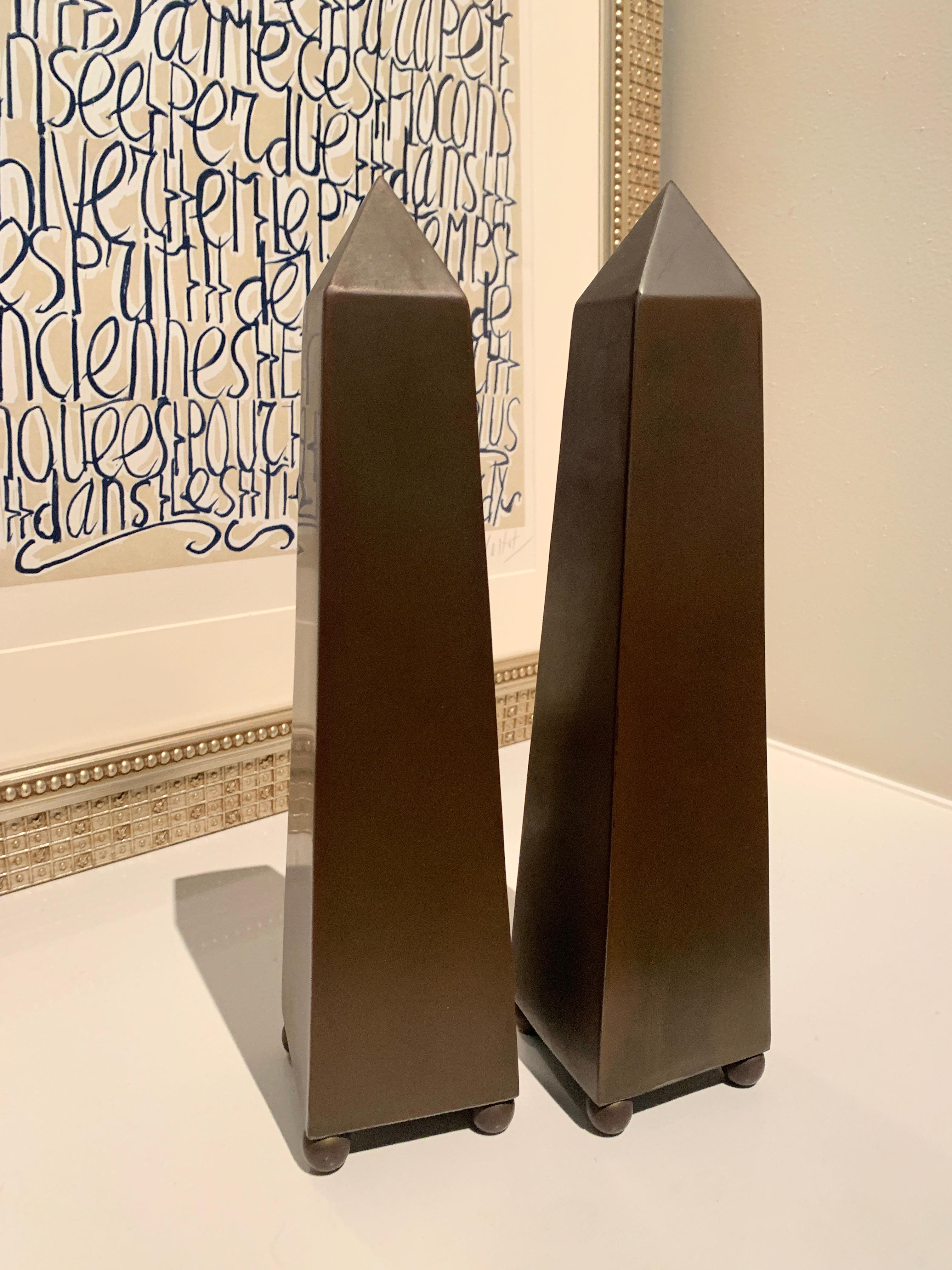 Mid-Century Modern Pair of Patinated Brass Obelisks on Sphere Feet For Sale