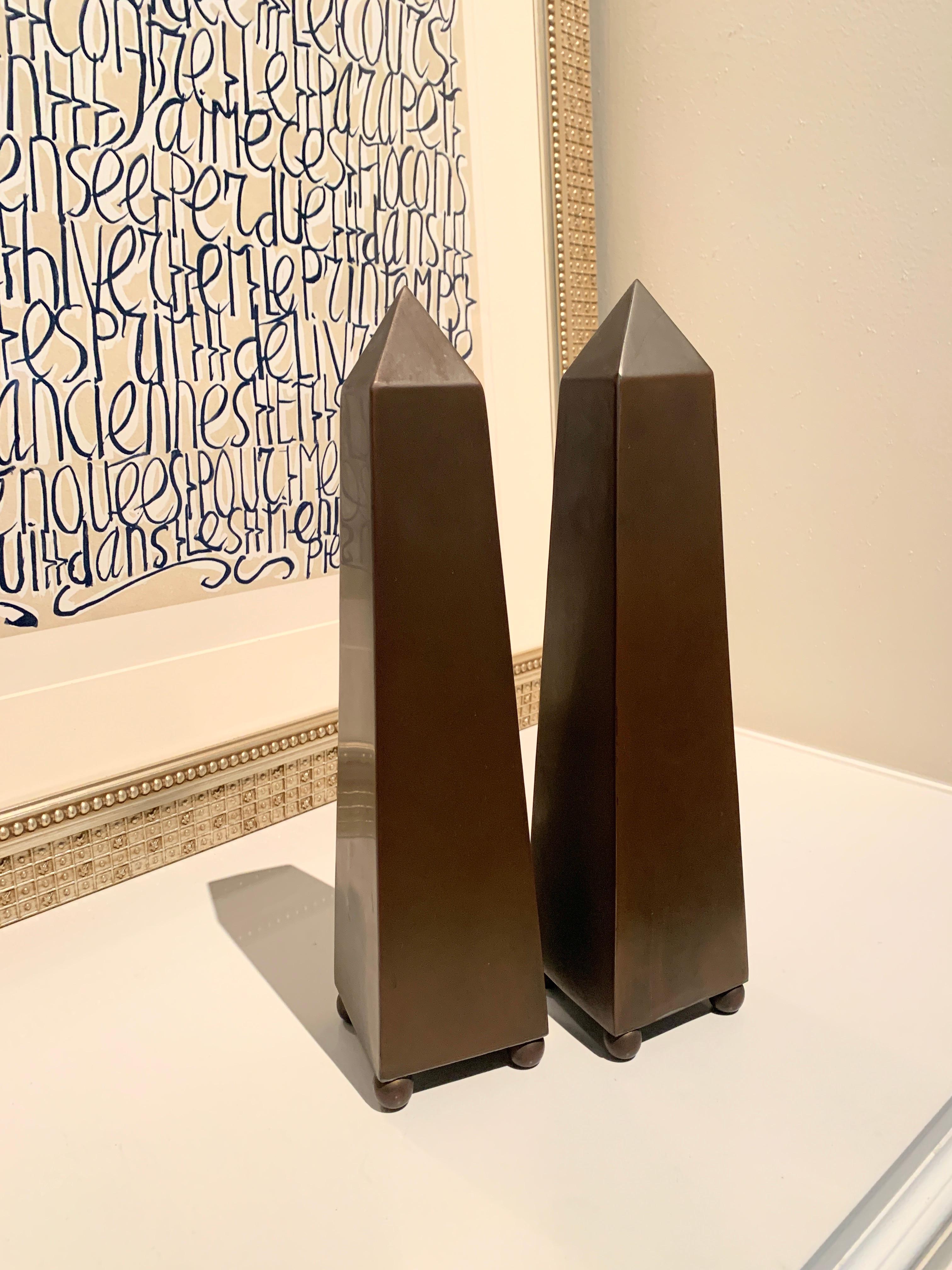 Pair of Patinated Brass Obelisks on Sphere Feet In Good Condition For Sale In Los Angeles, CA