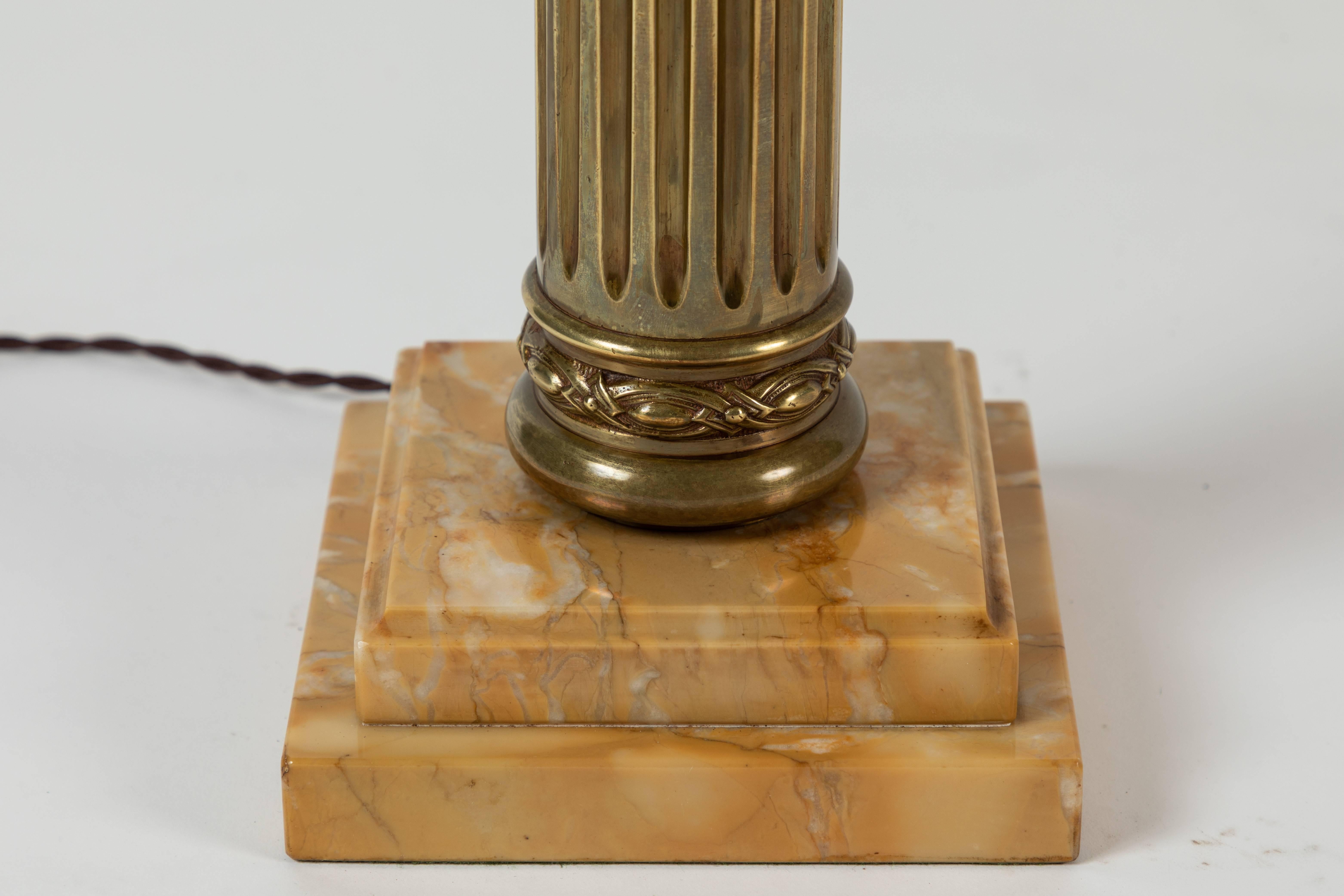 Laminated Pair of Patinated Brass Roman Column Table Lamps on Marble Bases