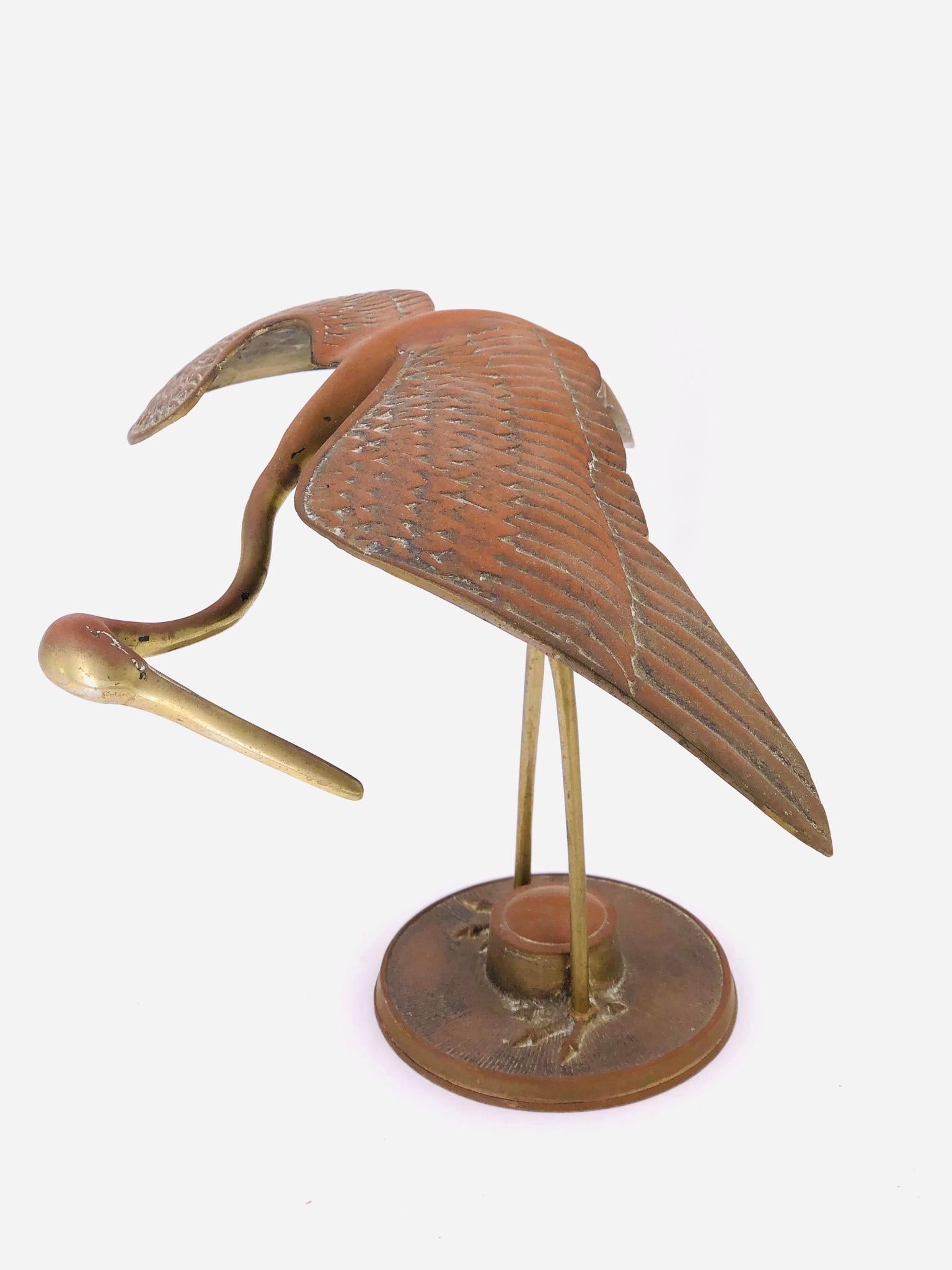 Nice pair of patinated brass stork birds sculptures, nice patina circa 1970s can be polished but we are selling them as/is condition.