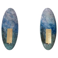 Pair of patinated brass wall lights. Contemporary work.