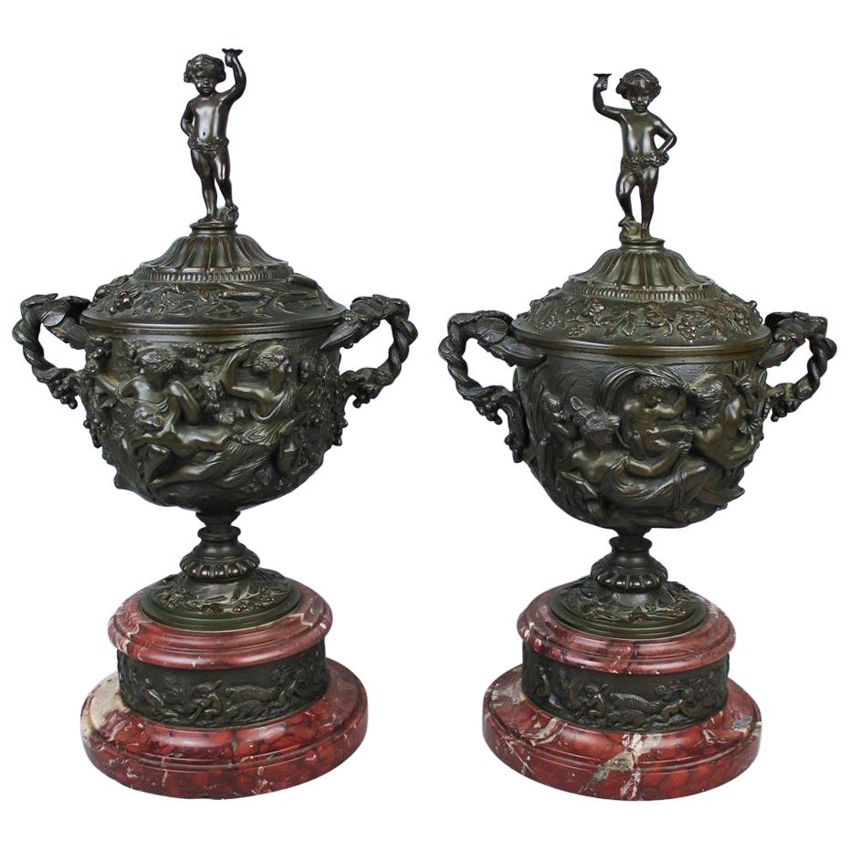 Pair of Patinated Bronze and Marble Urns For Sale