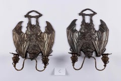 Pair of patinated bronze bat-shaped wall sconces after William Tonks & Sons