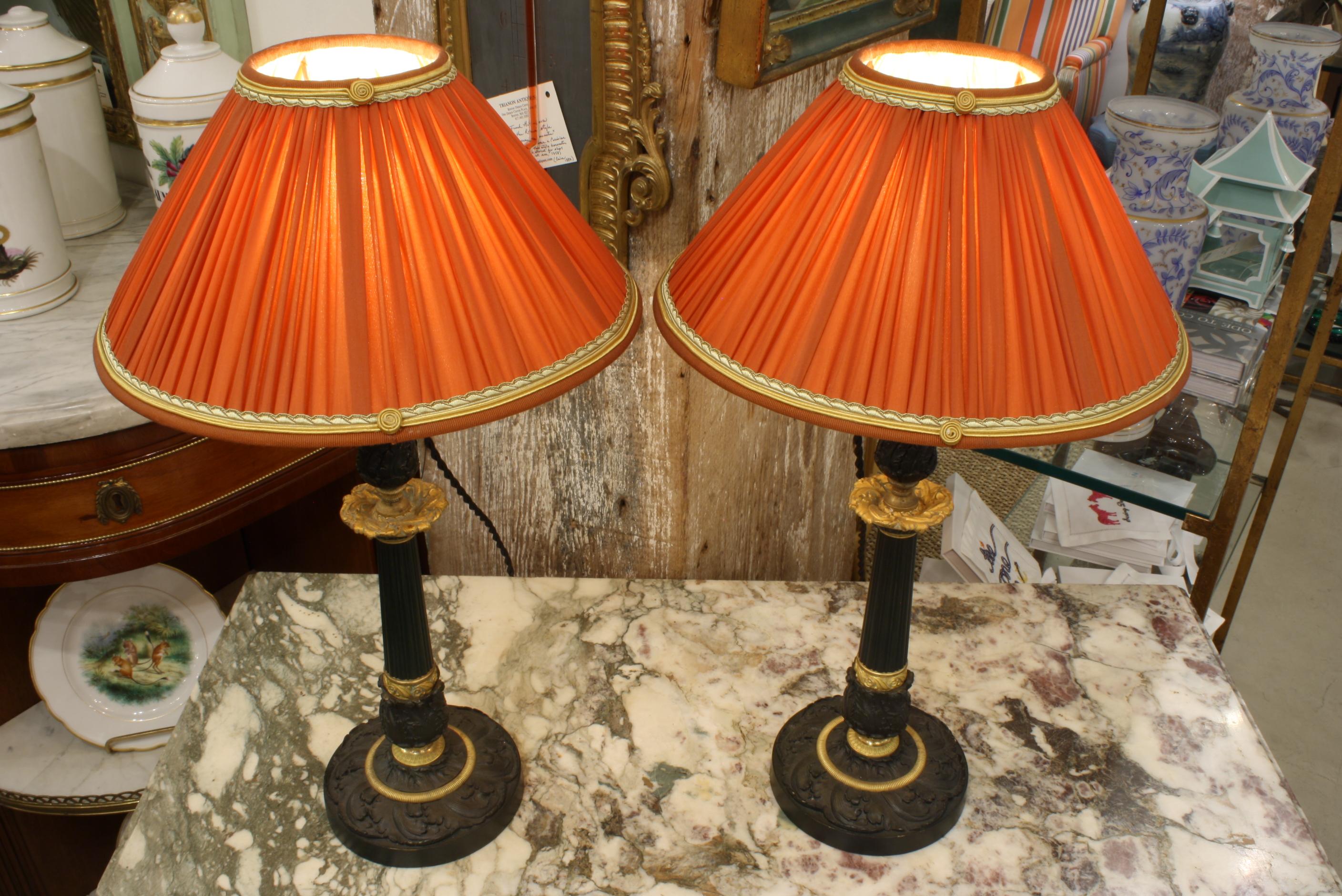 Restauration Pair of Gilt and Patinated Bronze Candlestick Lamps with Orange Silk Shades For Sale