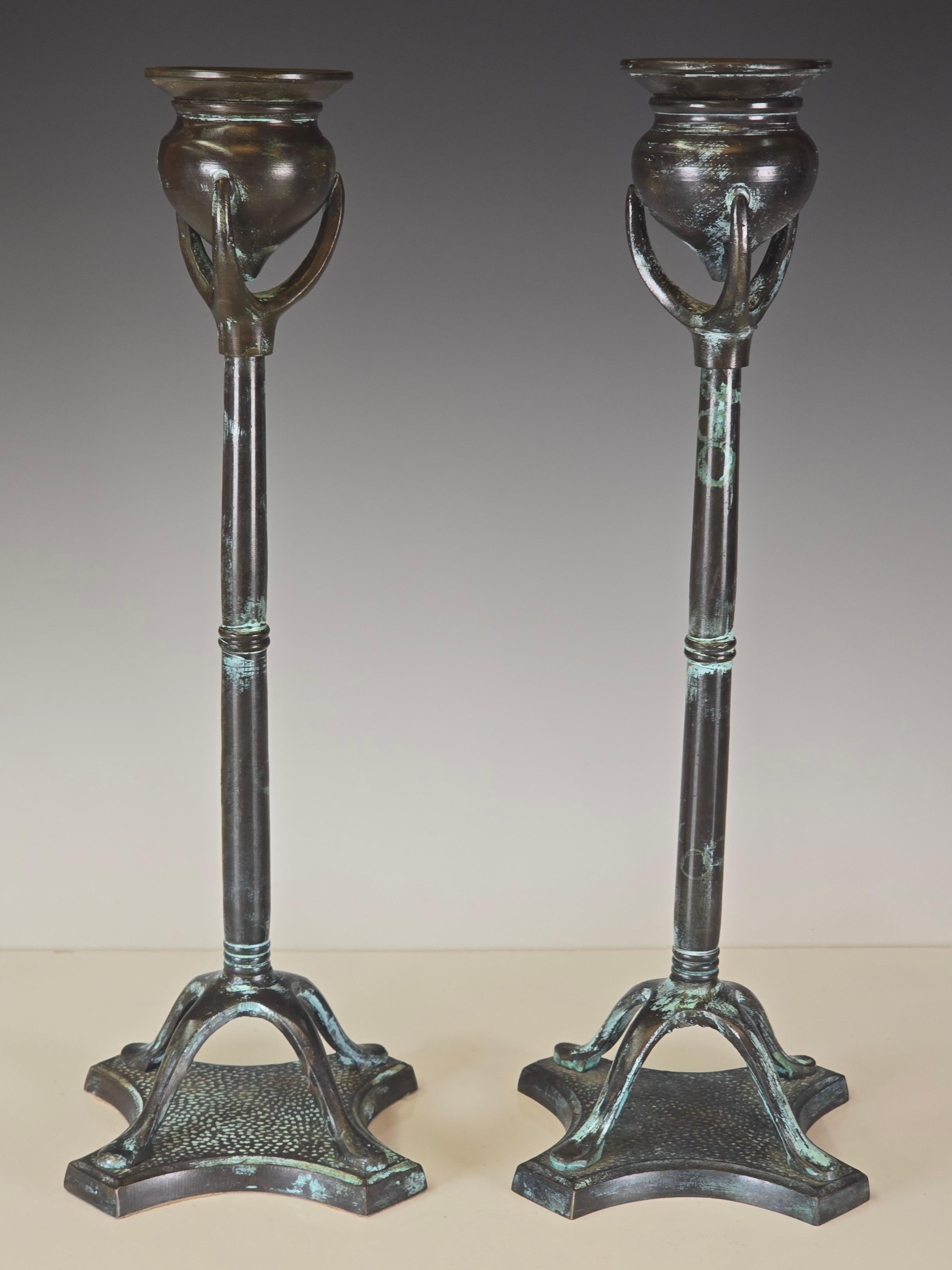 Art Nouveau Pair of Patinated Bronze Candlesticks For Sale