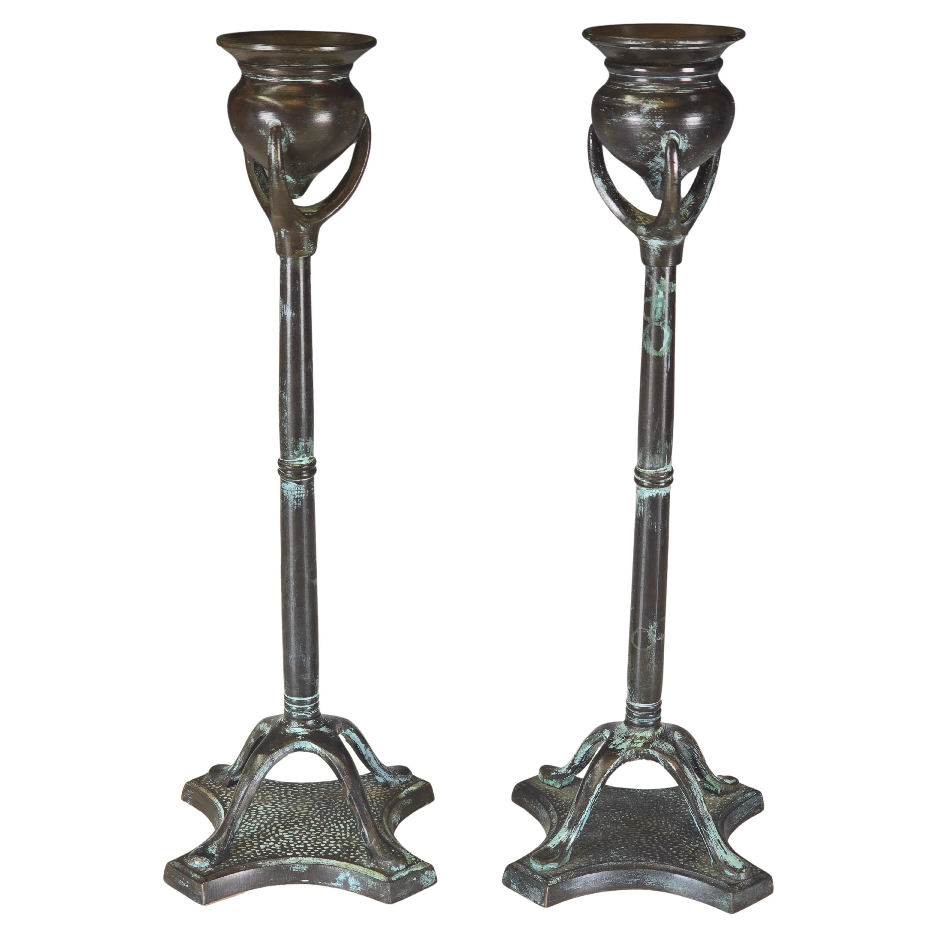 Pair of Patinated Bronze Candlesticks For Sale