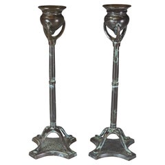 Pair of Patinated Bronze Candlesticks