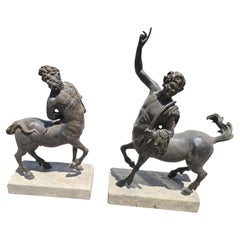 Pair of Patinated Bronze Centaur Sculptures on Marble Bases, First Half of the 2
