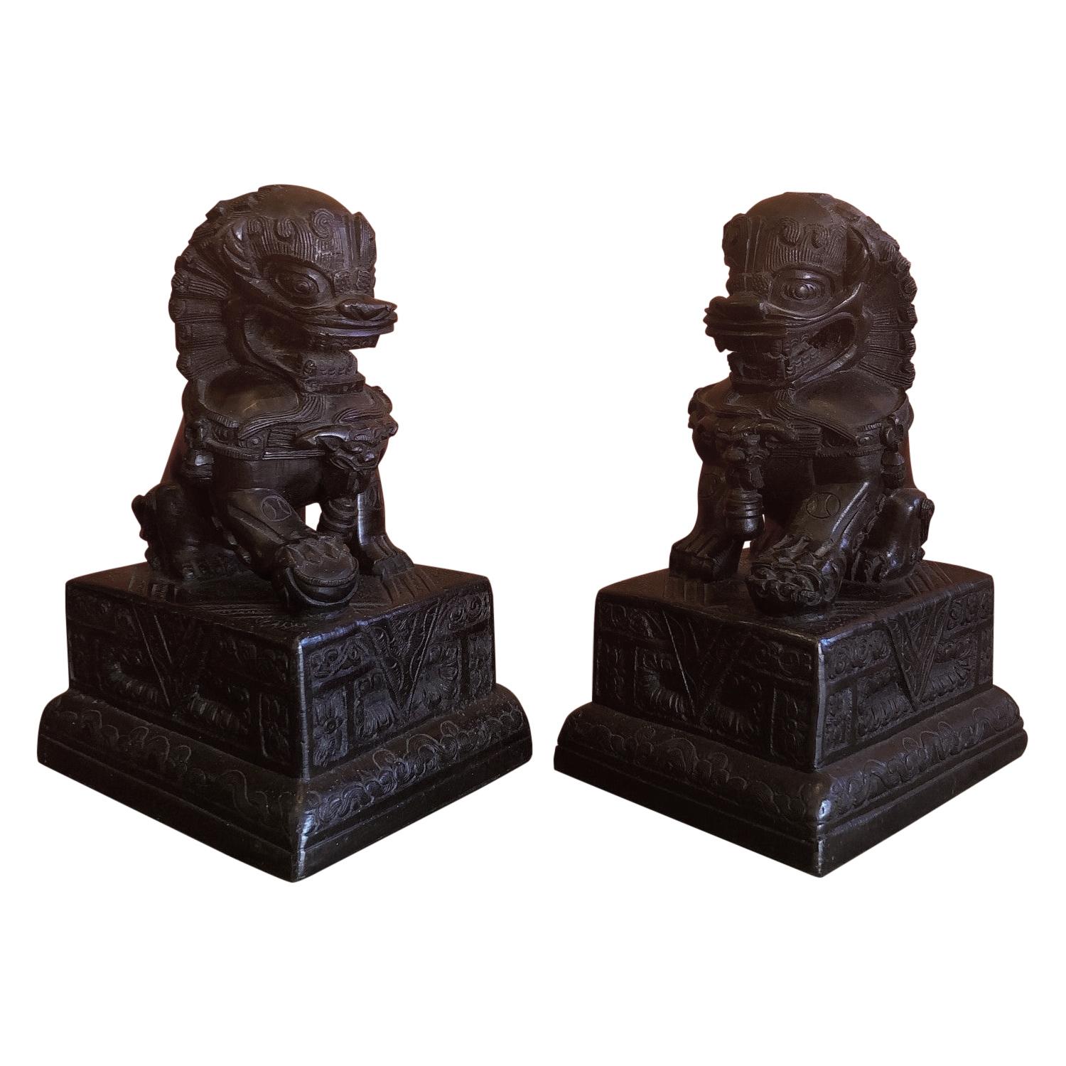 Pair of Patinated Bronze Chinese Foo Dogs / Book Ends For Sale