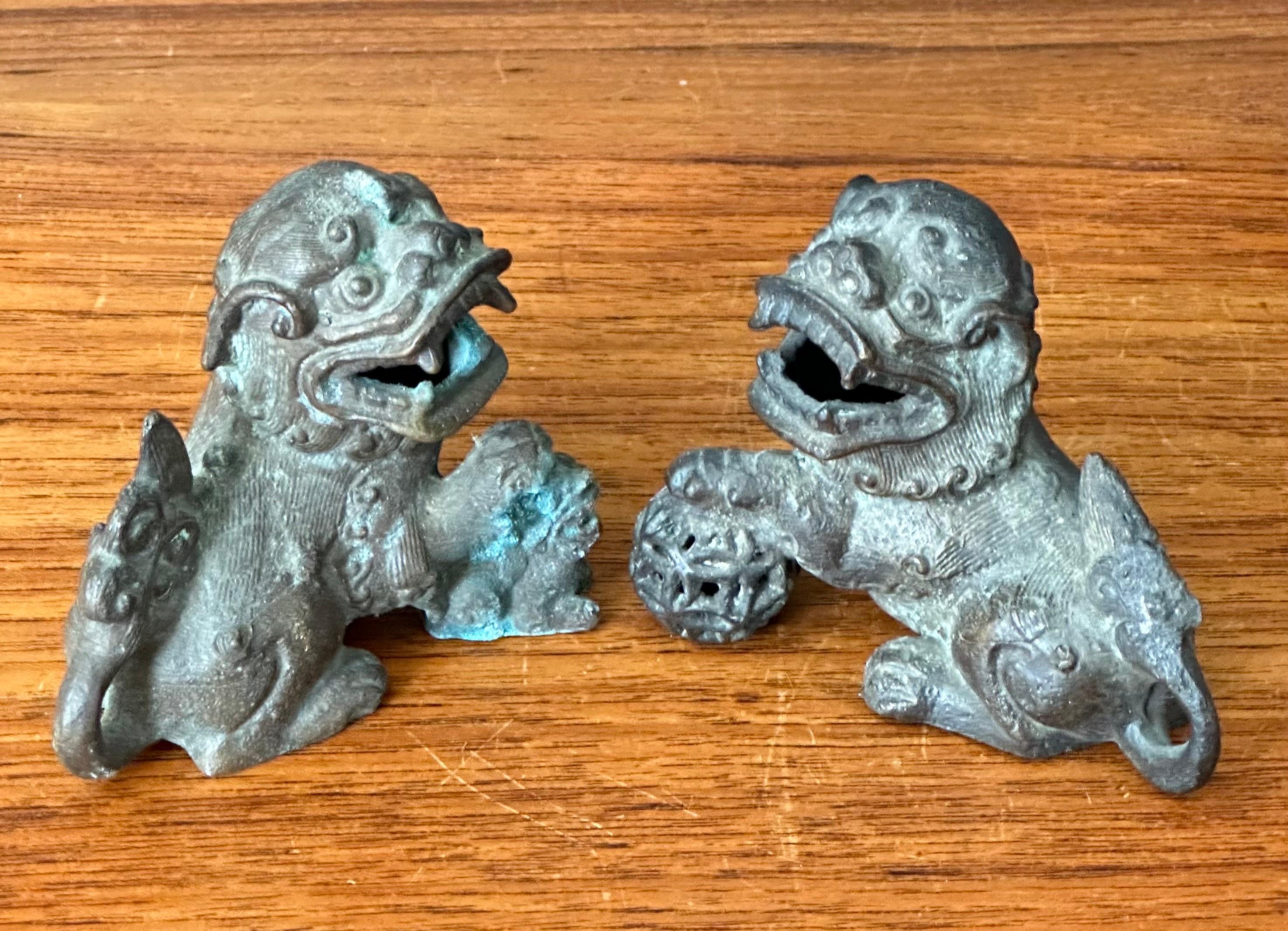 Pair of Patinated Bronze Chinese Foo Dogs For Sale 5