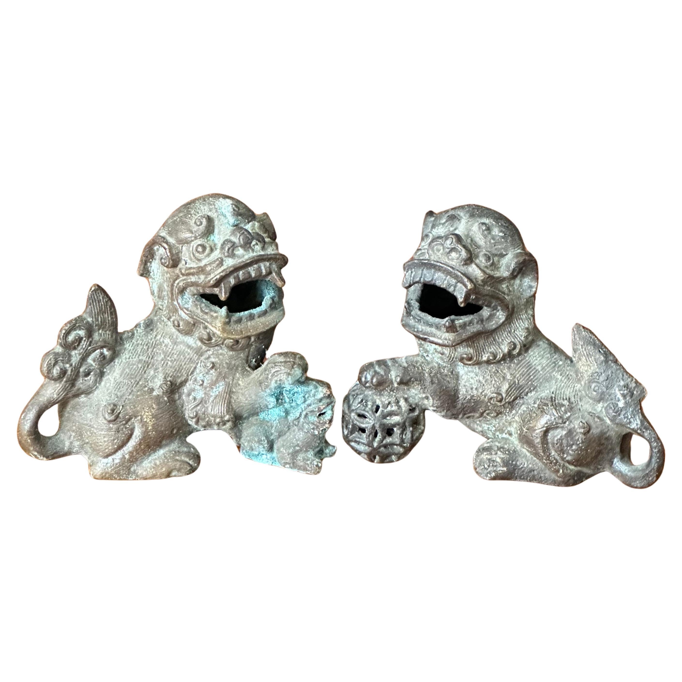 Pair of Patinated Bronze Chinese Foo Dogs For Sale 10