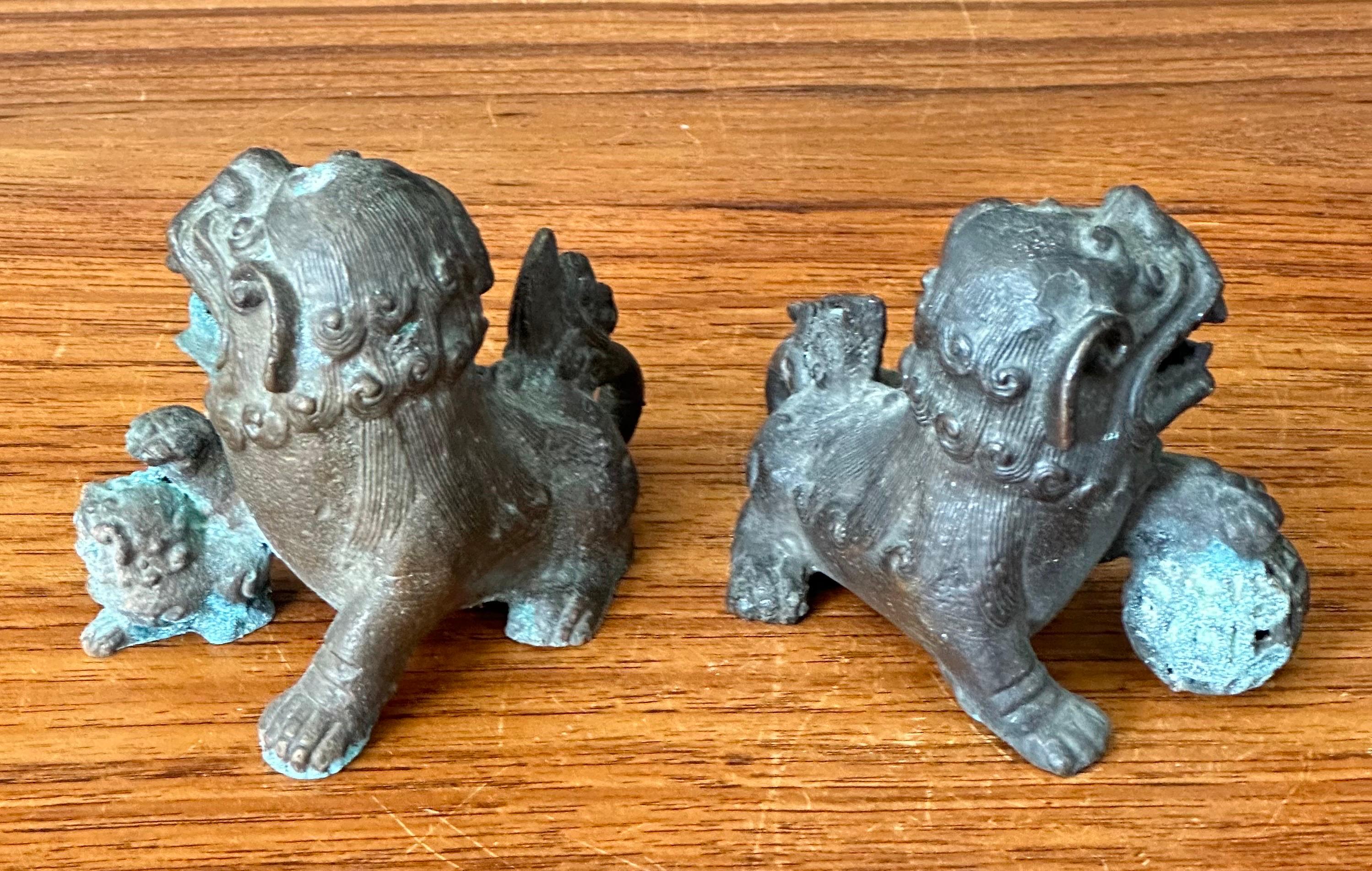 Pair of Patinated Bronze Chinese Foo Dogs For Sale 2