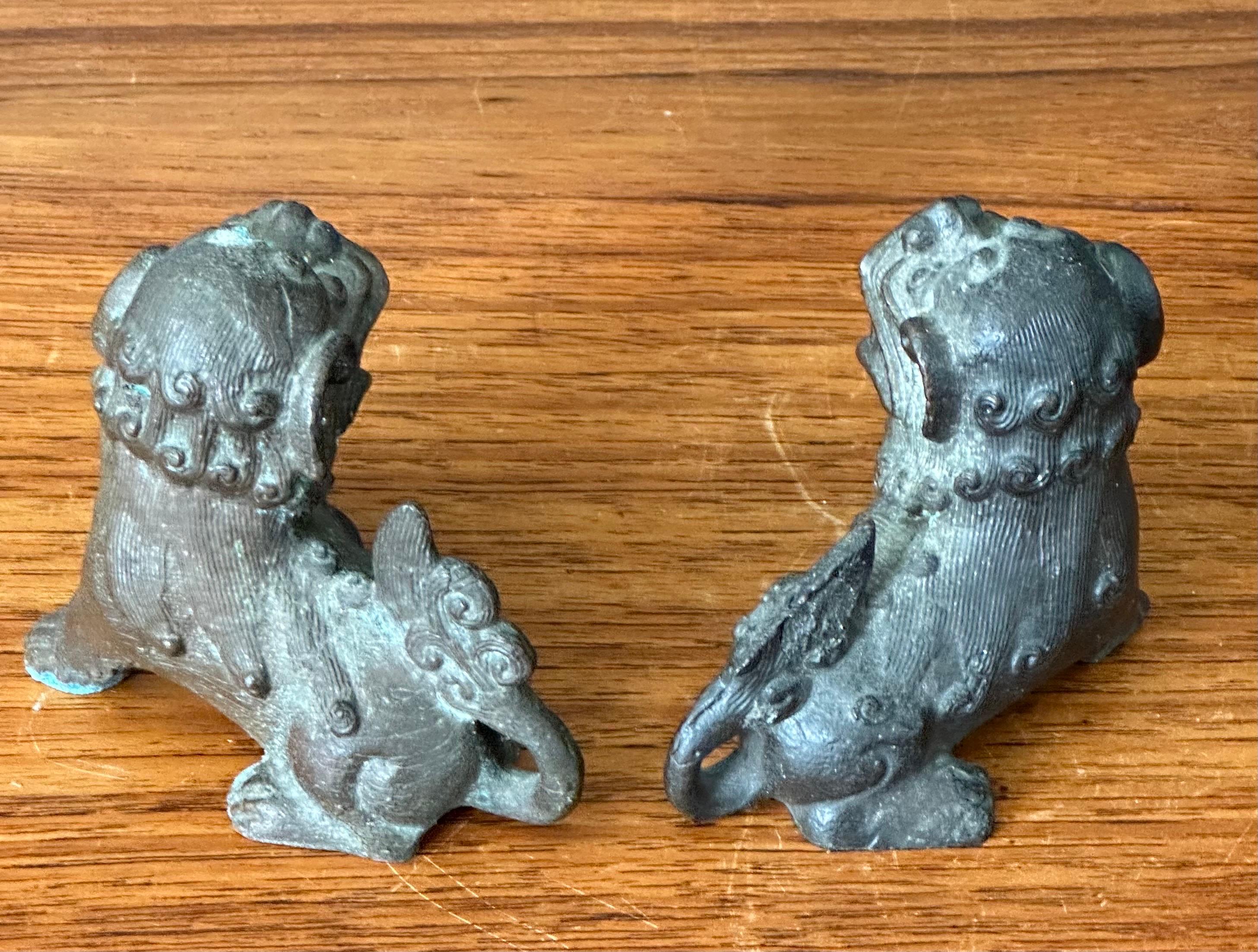 Pair of Patinated Bronze Chinese Foo Dogs For Sale 3
