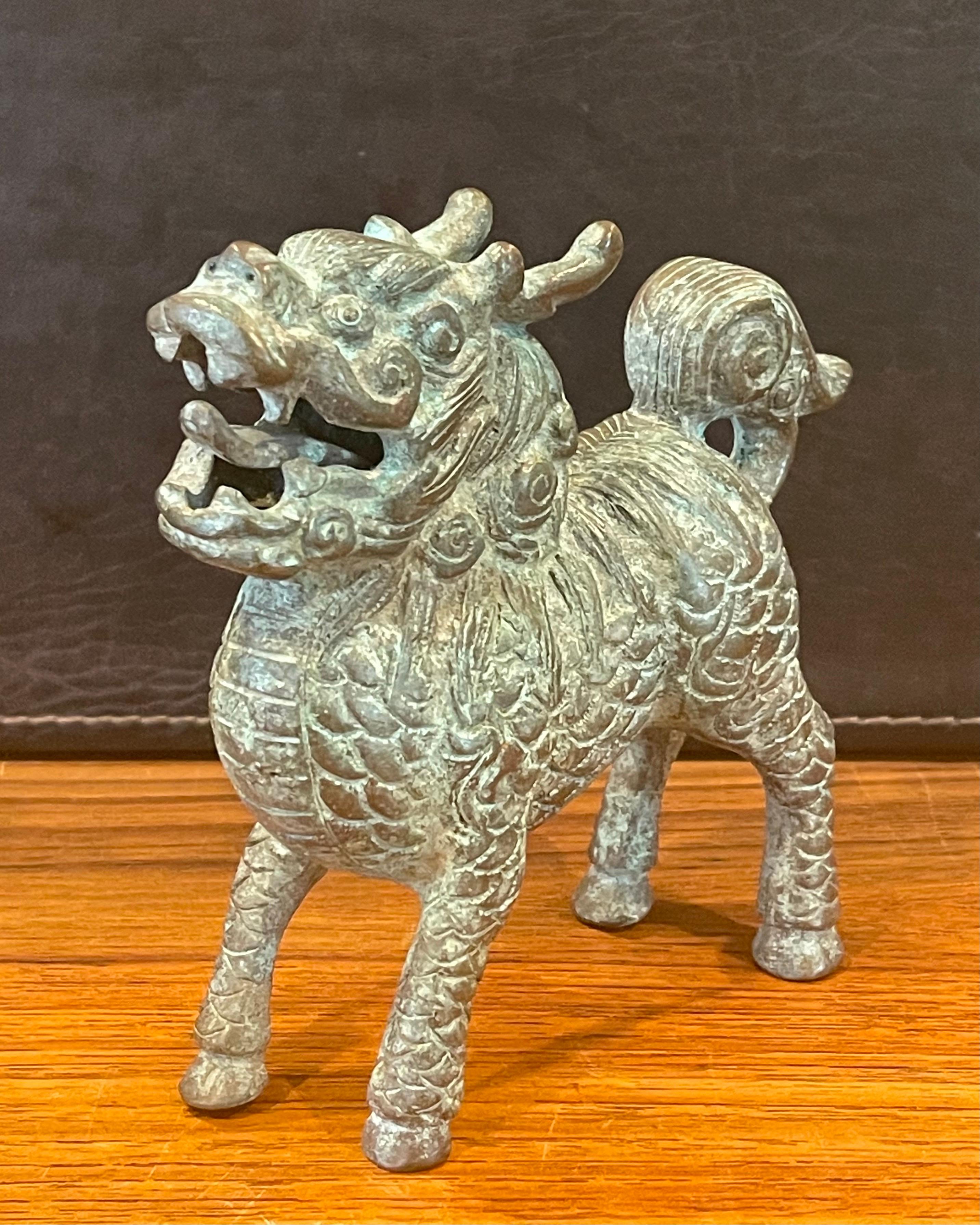 Pair of Patinated Bronze Chinese Foo Dogs with Verdigris Finish For Sale 4