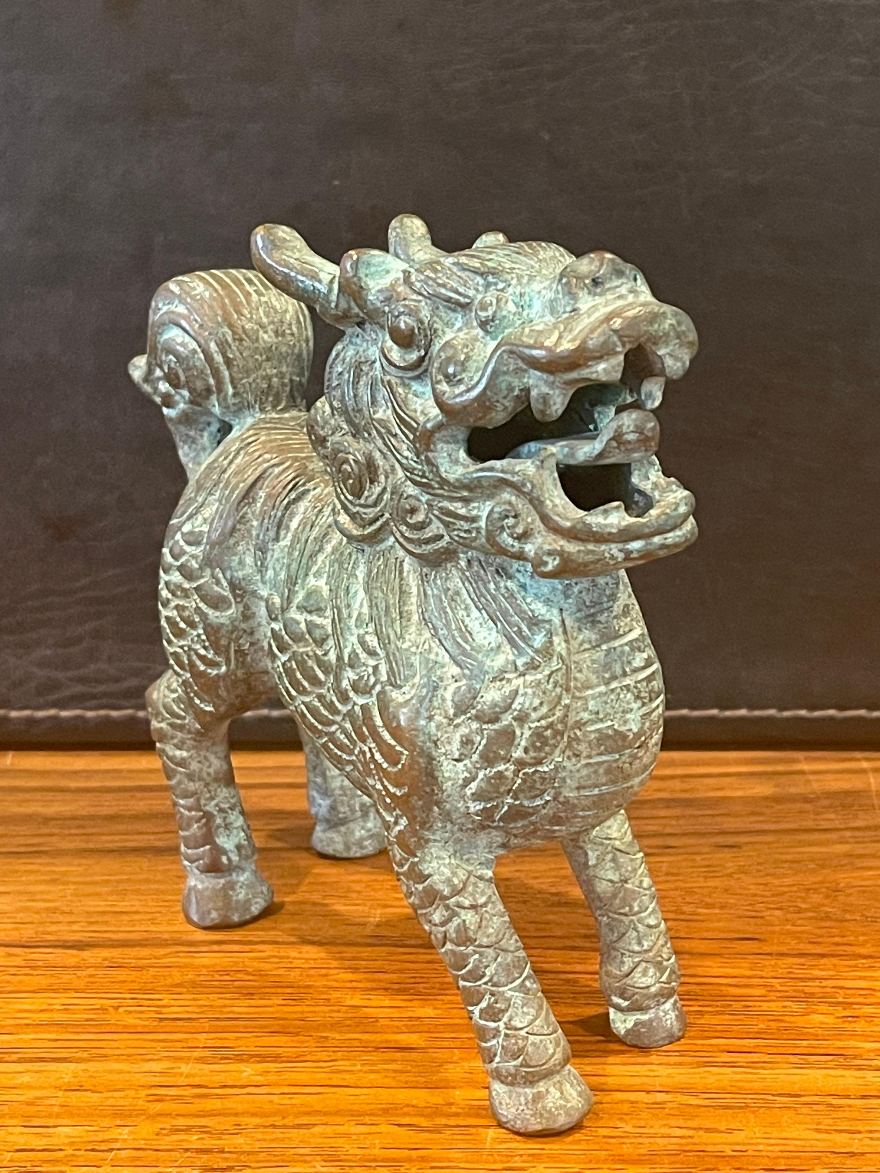 Pair of Patinated Bronze Chinese Foo Dogs with Verdigris Finish For Sale 5