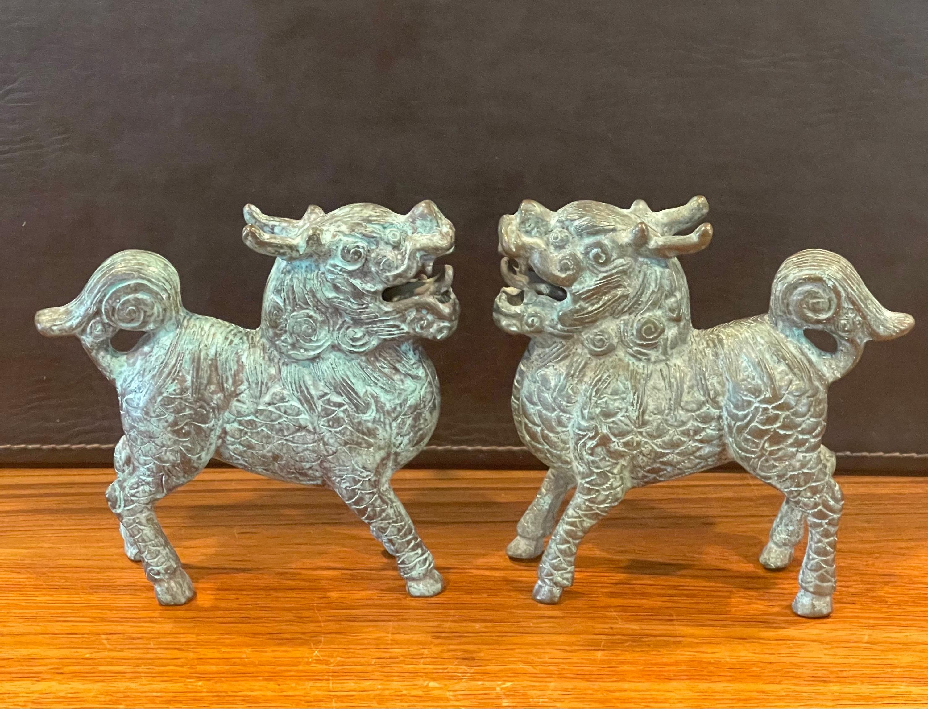 20th Century Pair of Patinated Bronze Chinese Foo Dogs with Verdigris Finish For Sale