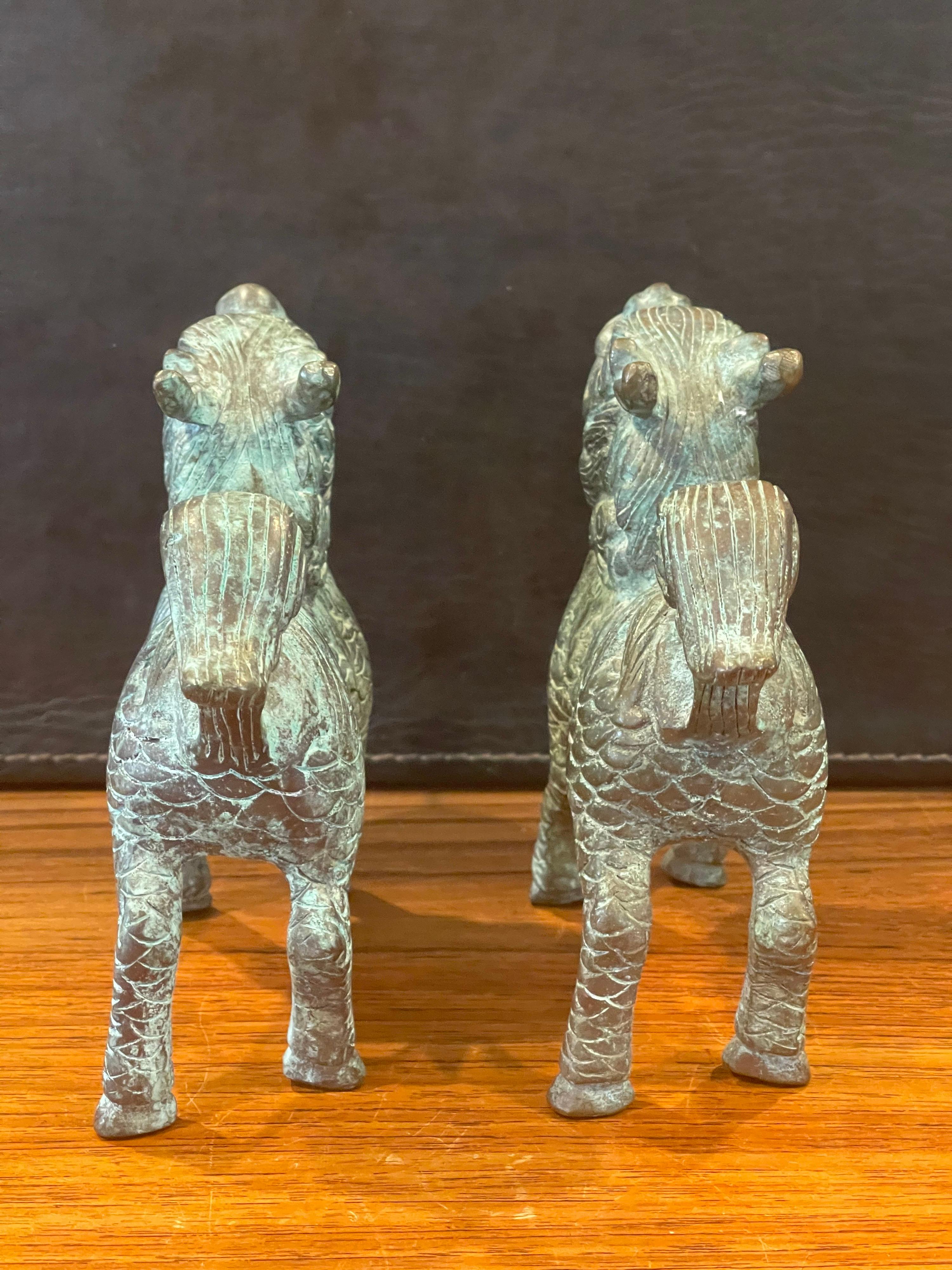 Pair of Patinated Bronze Chinese Foo Dogs with Verdigris Finish For Sale 1